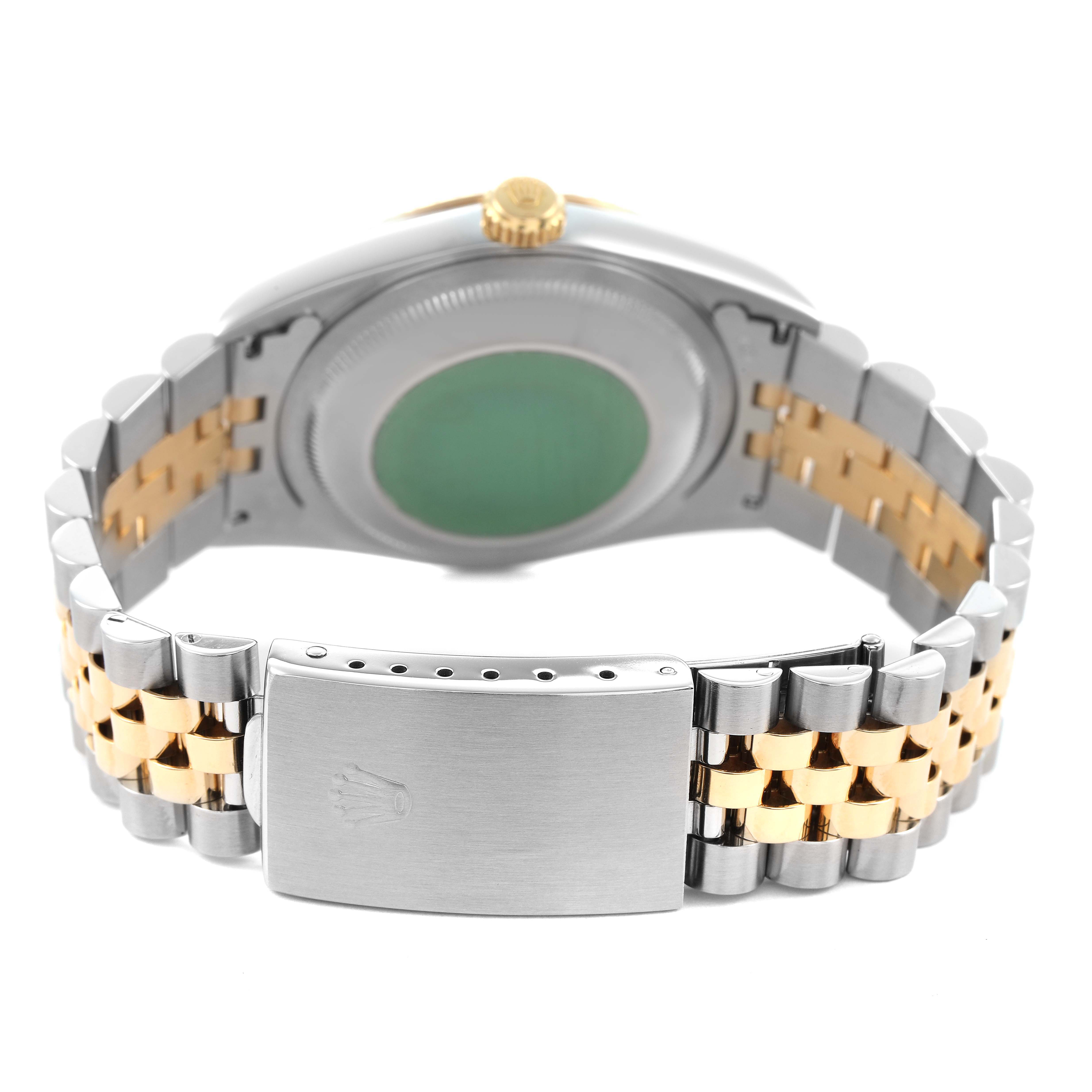 The Rolex Datejust 16233 Men's Stainless Steel Champagne Dial watch is shown from the back, highlighting the bracelet and clasp with the case back partially visible.