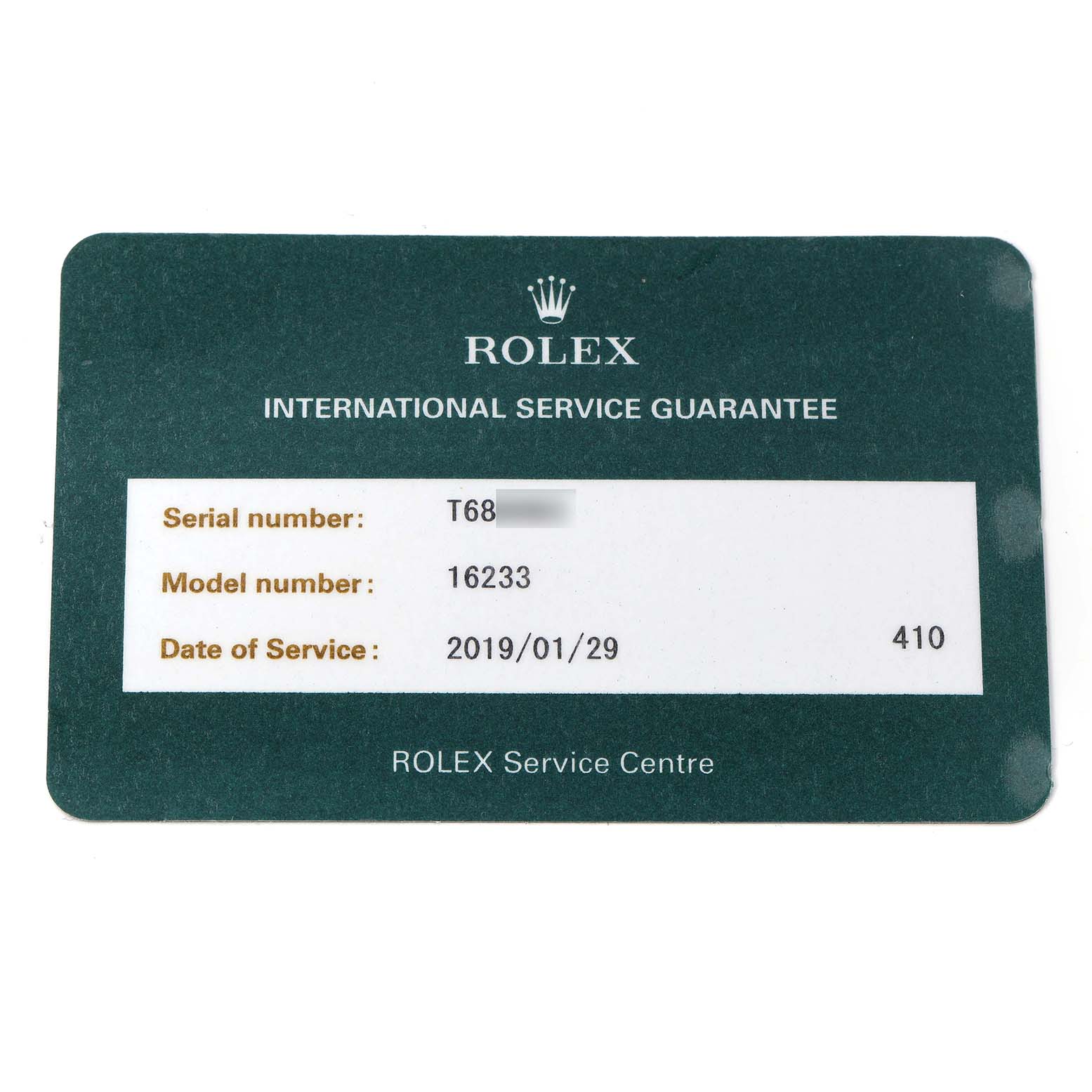 The image shows a Rolex Datejust 16233 Men
s Steel and Gold (two tone) Yellow Dial 16233 Men
s Steel and Gold (two tone) Yellow Dial service guarantee card from a top-down angle.