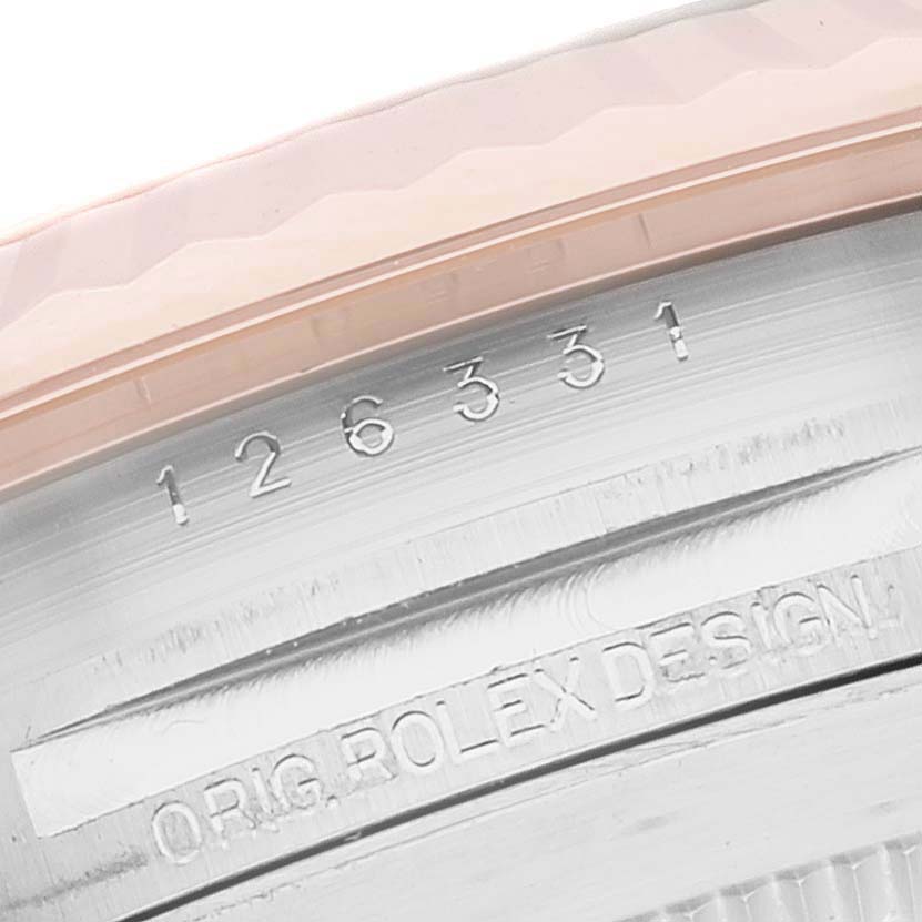 This image shows a close-up of the case side of the Rolex Datejust 41 126331 Men's Steel and Gold (two tone) Pink Dial 126331 Men's Steel and Gold (two tone) Pink Dial model, displaying the engraved model number "126331."