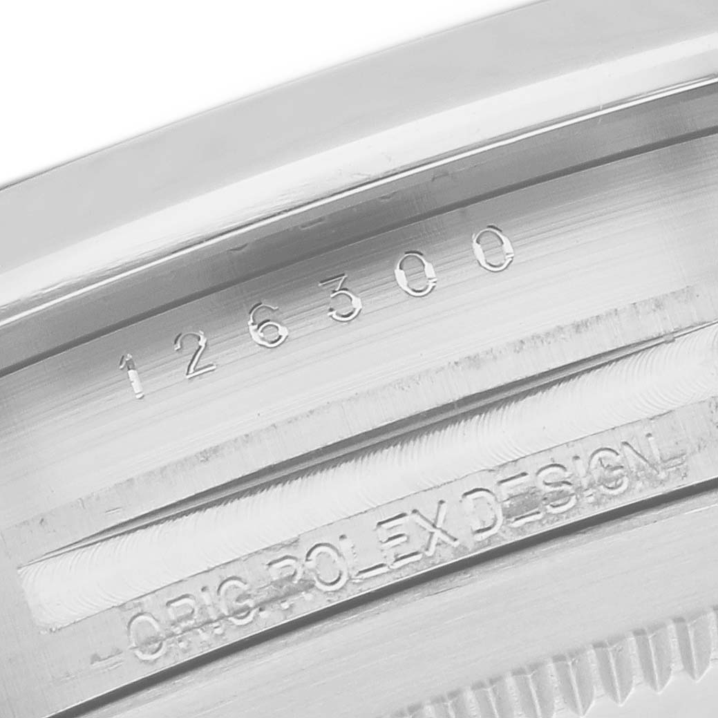 This is a close-up image of the case with the serial and model number of a Rolex Datejust 41 126300 Men's Stainless Steel White Dial 126300 Men's Stainless Steel White Dial watch.