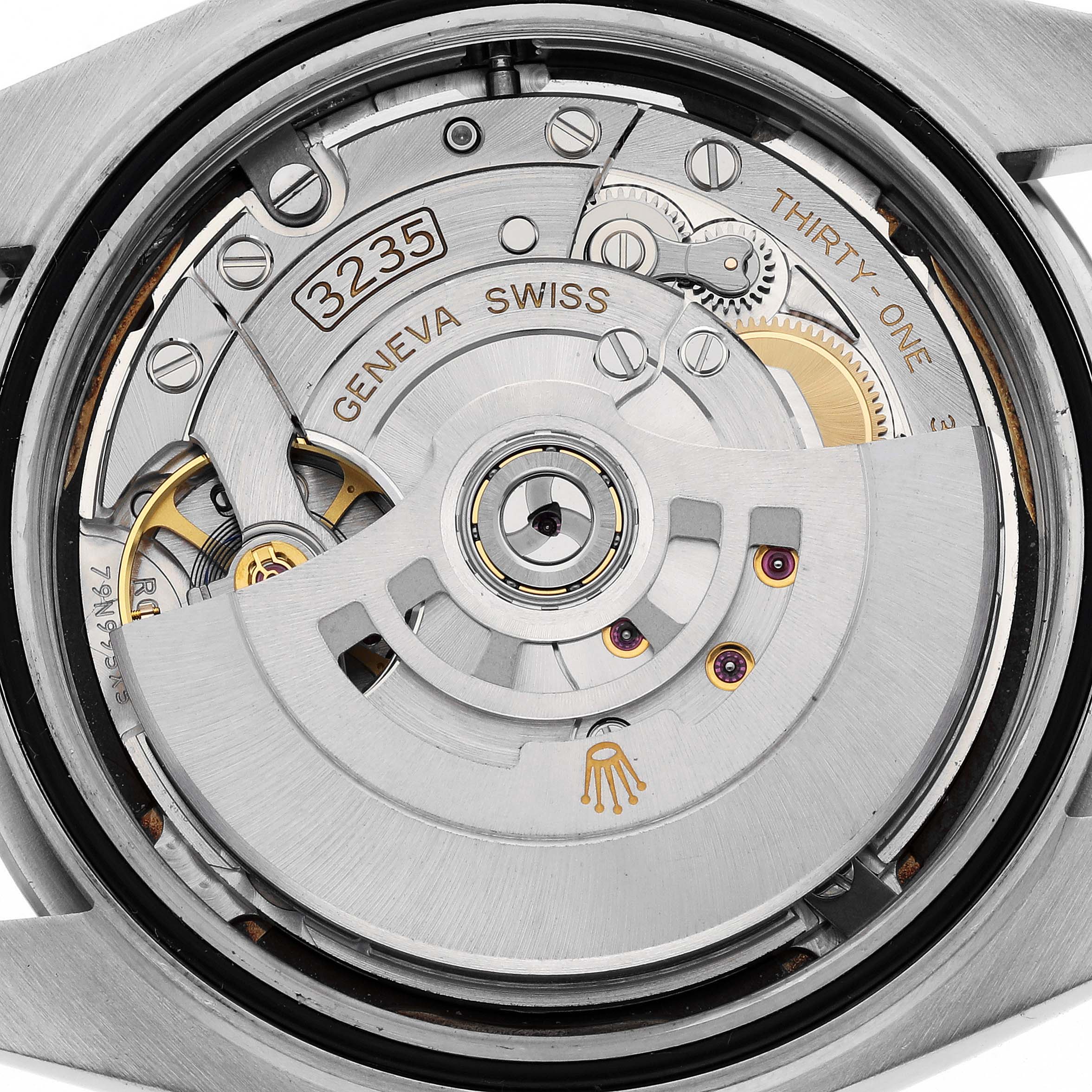 This is a close-up view of the movement of a Rolex Datejust 41 126300 Men's Stainless Steel White Dial 126300 Men's Stainless Steel White Dial watch, showing intricate mechanical components.