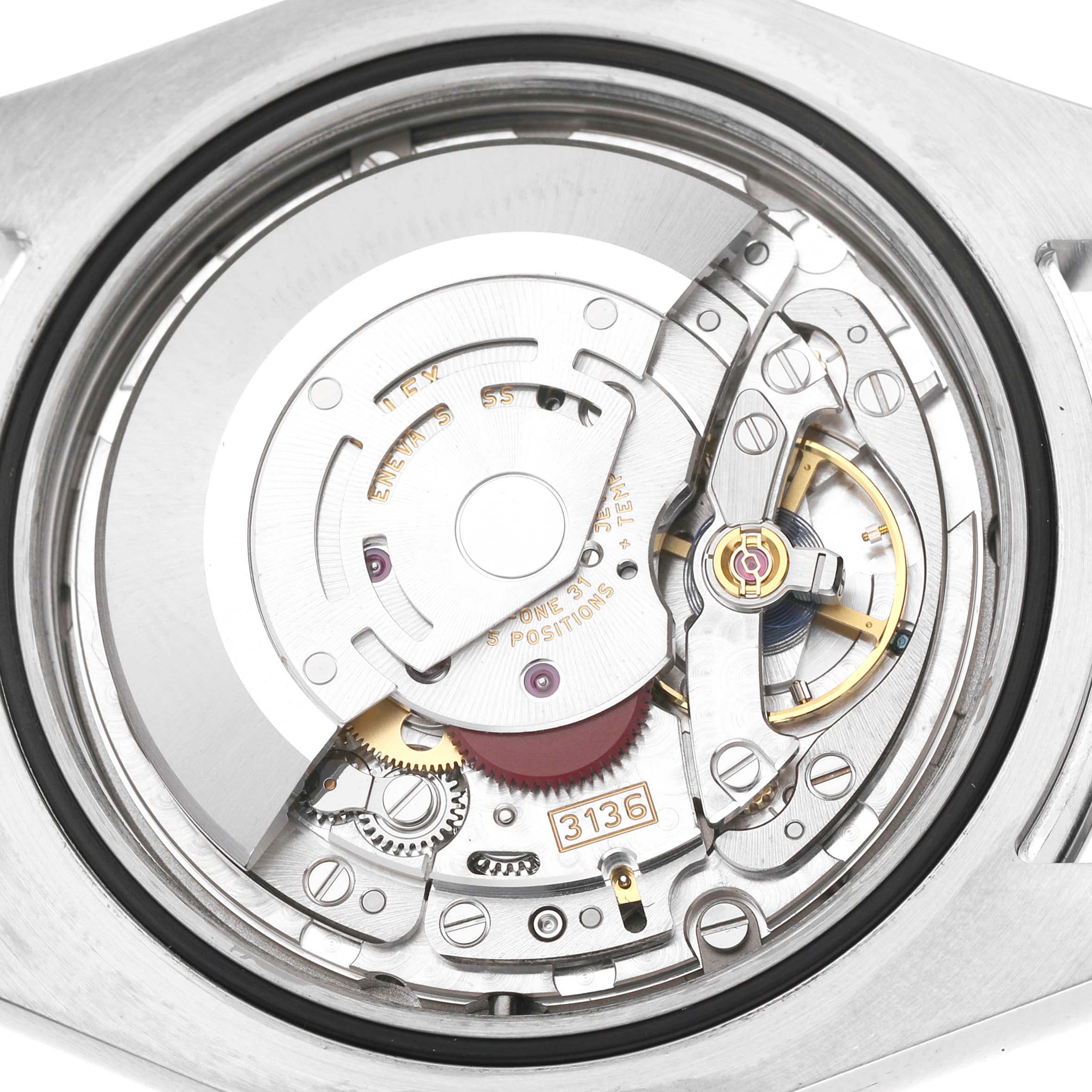 The image shows the movement of a Rolex Datejust 41 116300 Men's Stainless Steel Black Dial, highlighting its intricate inner mechanisms from a back view.