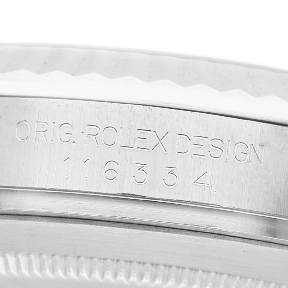 The image shows the side view of a Rolex Datejust 41 116334 Men's Stainless Steel Silver Dial, highlighting the engraved serial number on its metal case.