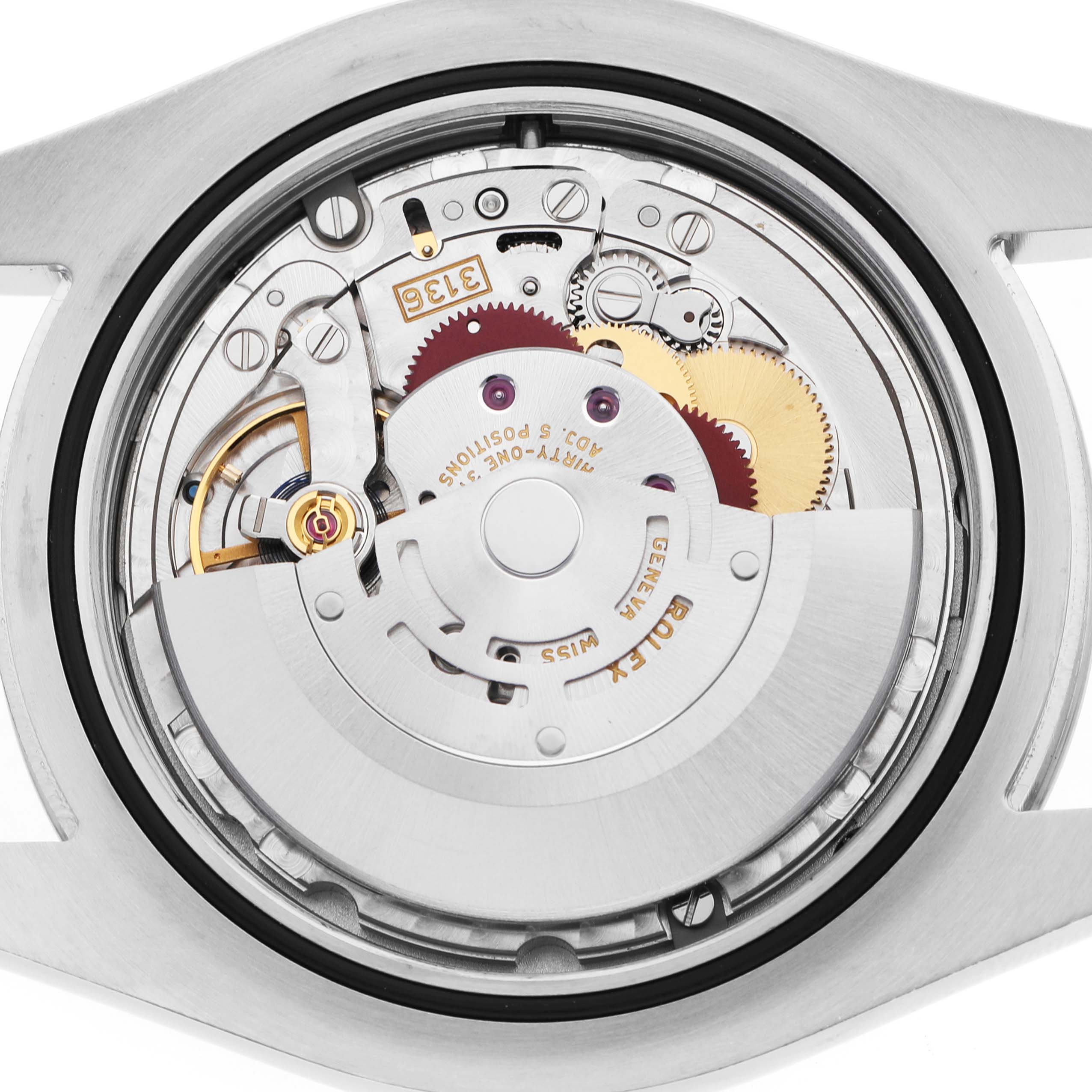 The image shows the movement and internal mechanism of a Rolex Datejust 41 116334 Men's Stainless Steel Grey Dial from a rear angle.