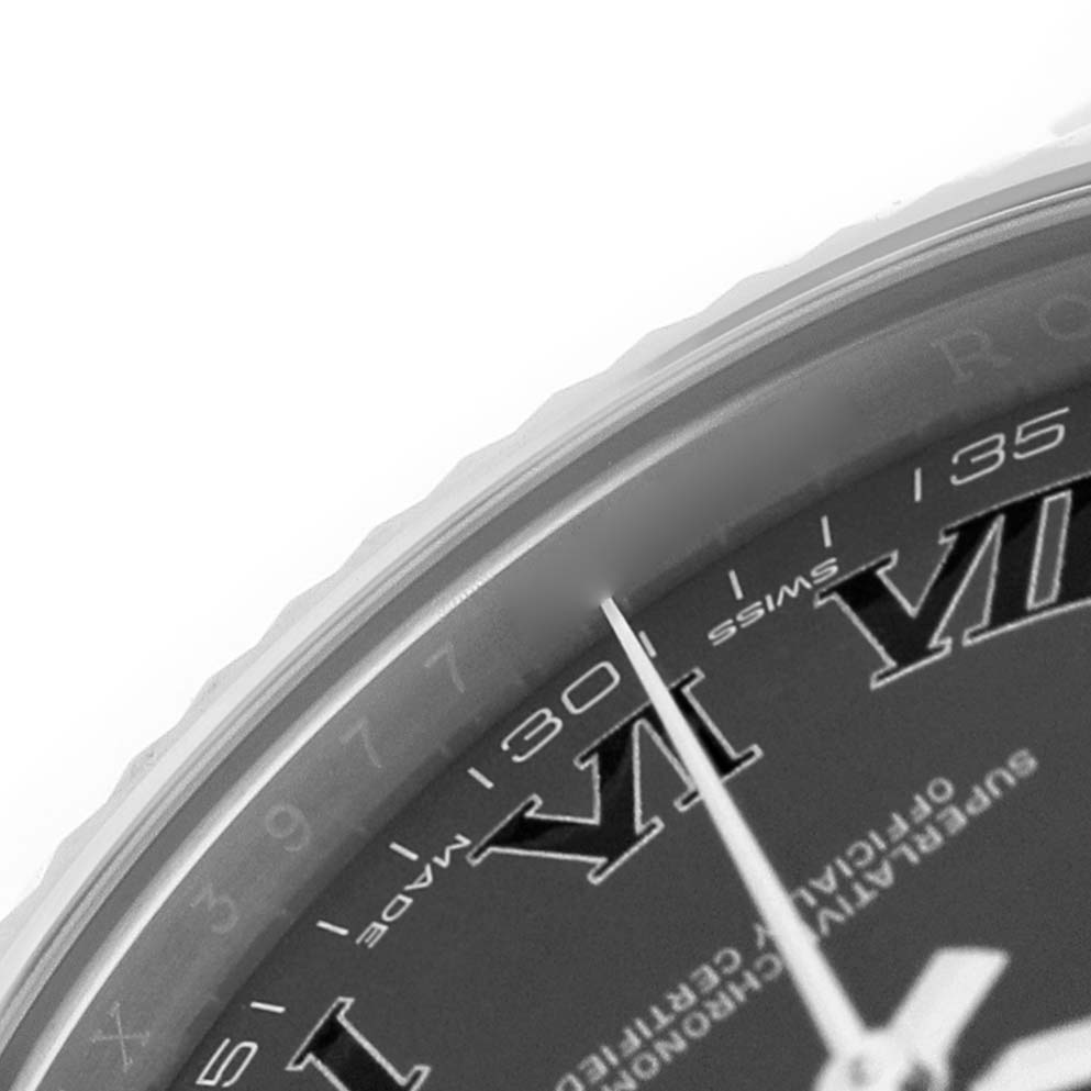 The image shows a close-up of the dial and bezel edge of a Rolex Datejust 41 116334 Men's Stainless Steel Grey Dial, featuring Roman numerals.