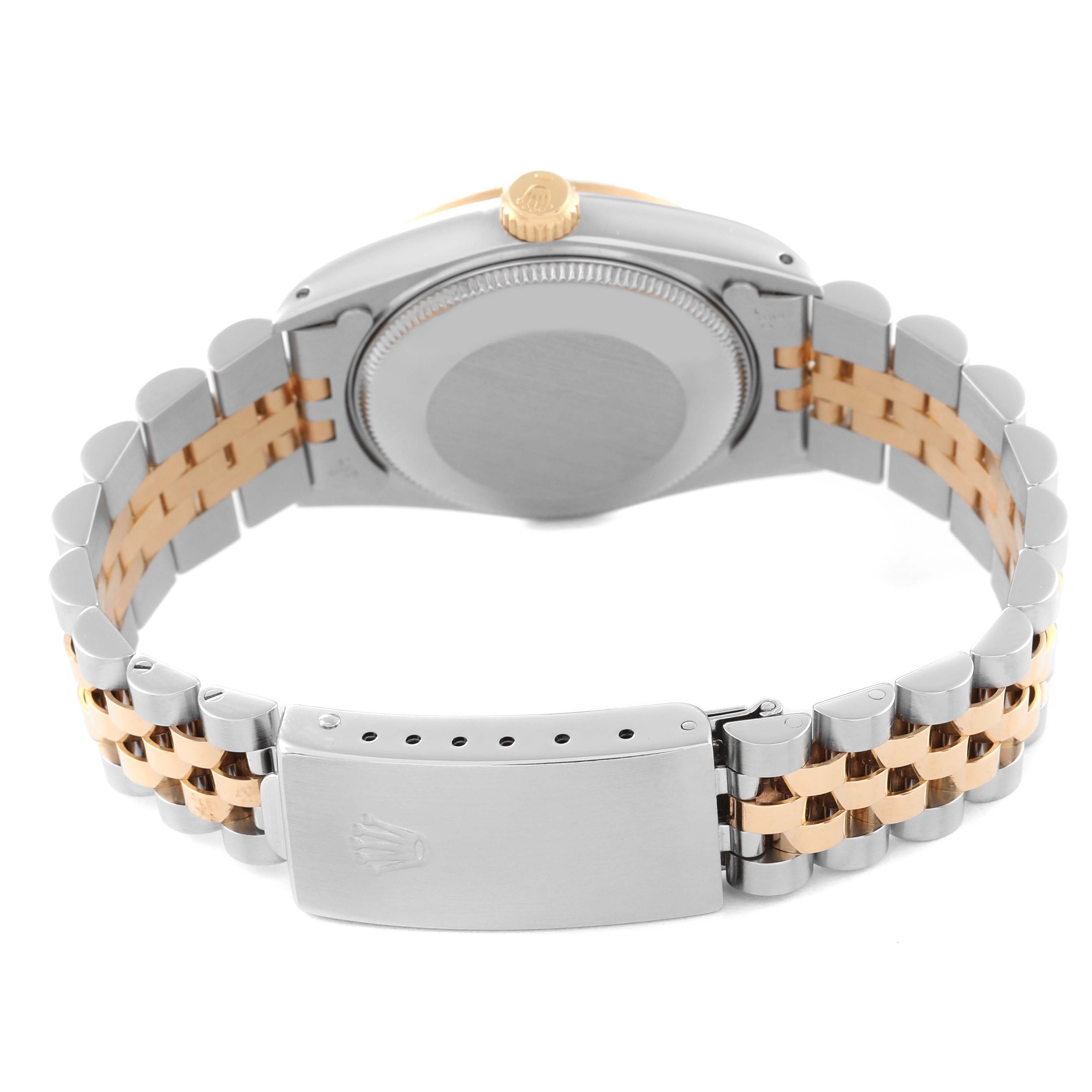 This image of the Rolex Mid-Size 68273 Women's Steel and Gold (two tone) Champagne Dial 68273 Women's Steel and Gold (two tone) Champagne Dial model shows the back of the watch case and the two-tone bracelet clasp.