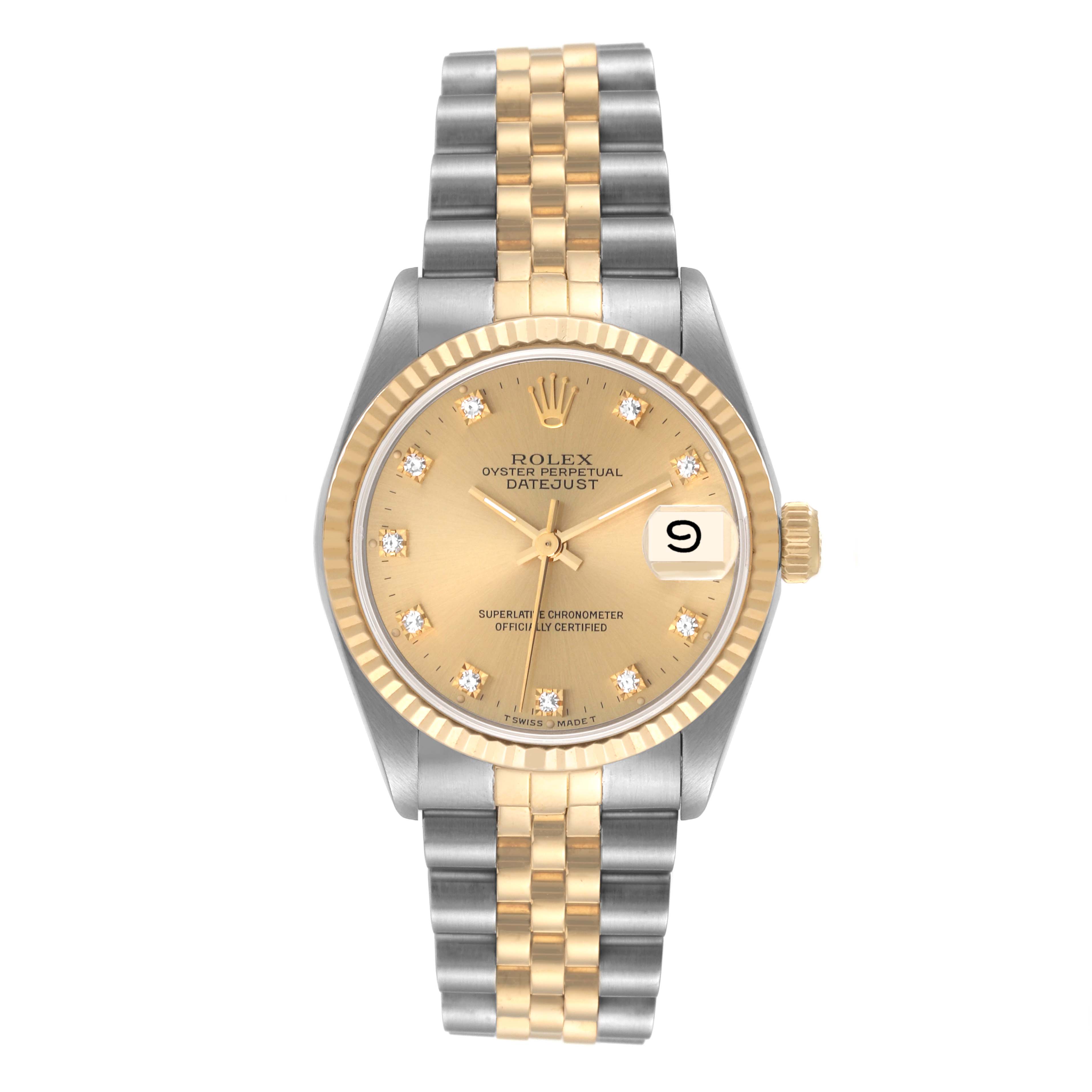 The image shows a frontal view of a Rolex Mid-Size 68273 Women's Steel and Gold (two tone) Champagne Dial 68273 Women's Steel and Gold (two tone) Champagne Dial Datejust watch with a gold and steel bracelet and a champagne dial.