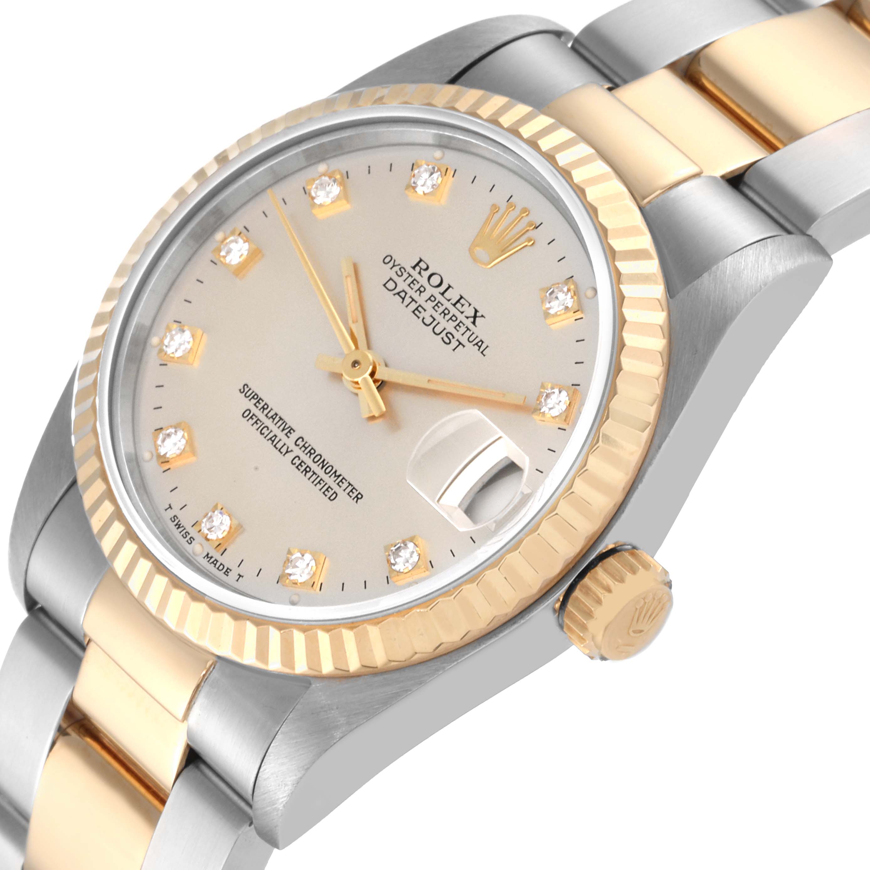 This image shows a close-up of the dial, bezel, and part of the bracelet of a Rolex Mid-Size 68273 Women's Steel and Gold (two tone) Silver Dial 68273 Women's Steel and Gold (two tone) Silver Dial Datejust watch.