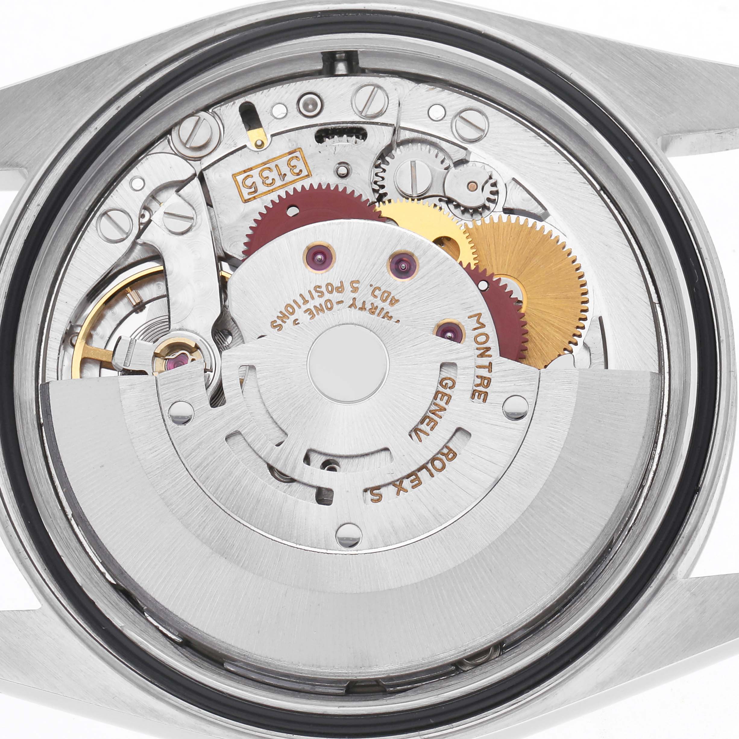 The image shows the movement mechanism of a Rolex Datejust 16220 Men
s Stainless Steel Silver Dial 16220 Men
s Stainless Steel Silver Dial watch, viewed from the back with gears and intricate components visible.