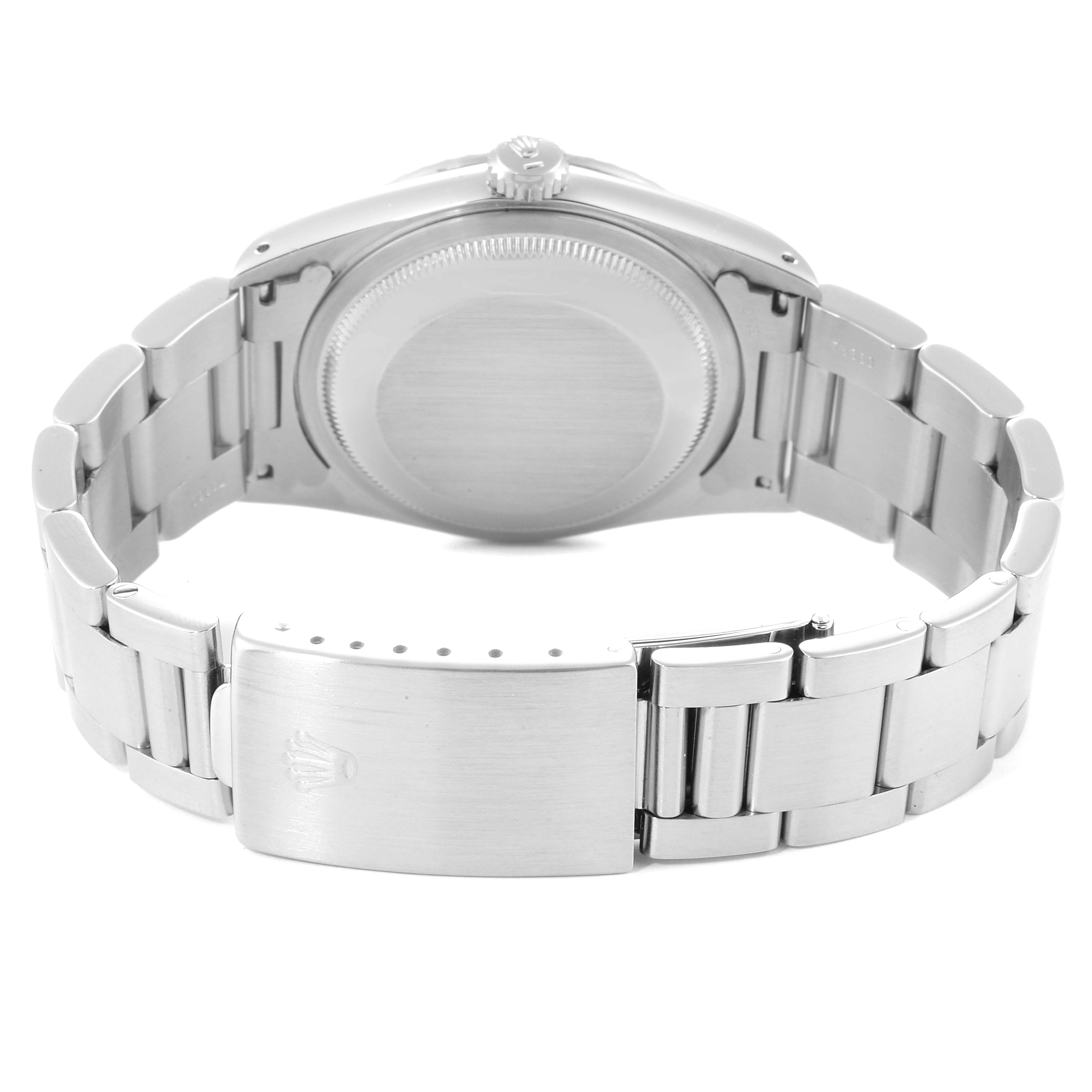 The image shows the back view of a Rolex Datejust 16220 Men's Stainless Steel Silver Dial 16220 Men's Stainless Steel Silver Dial watch, highlighting the case back, bracelet, and clasp.