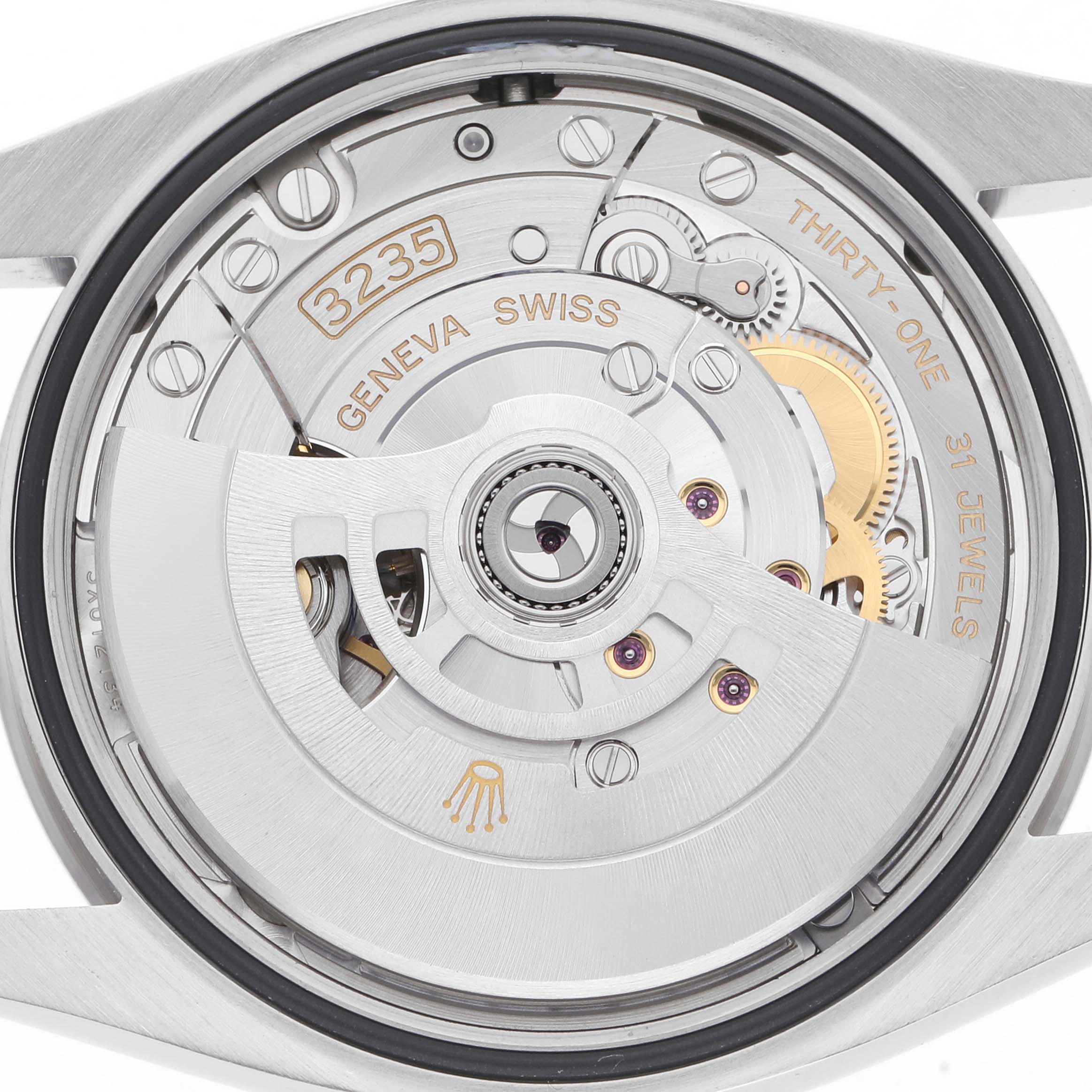 The image shows the movement of a Rolex Datejust 126234 Men
s Stainless Steel Blue Dial 126234 Men
s Stainless Steel Blue Dial watch with a focus on the caliber and jewels, viewed from the back.