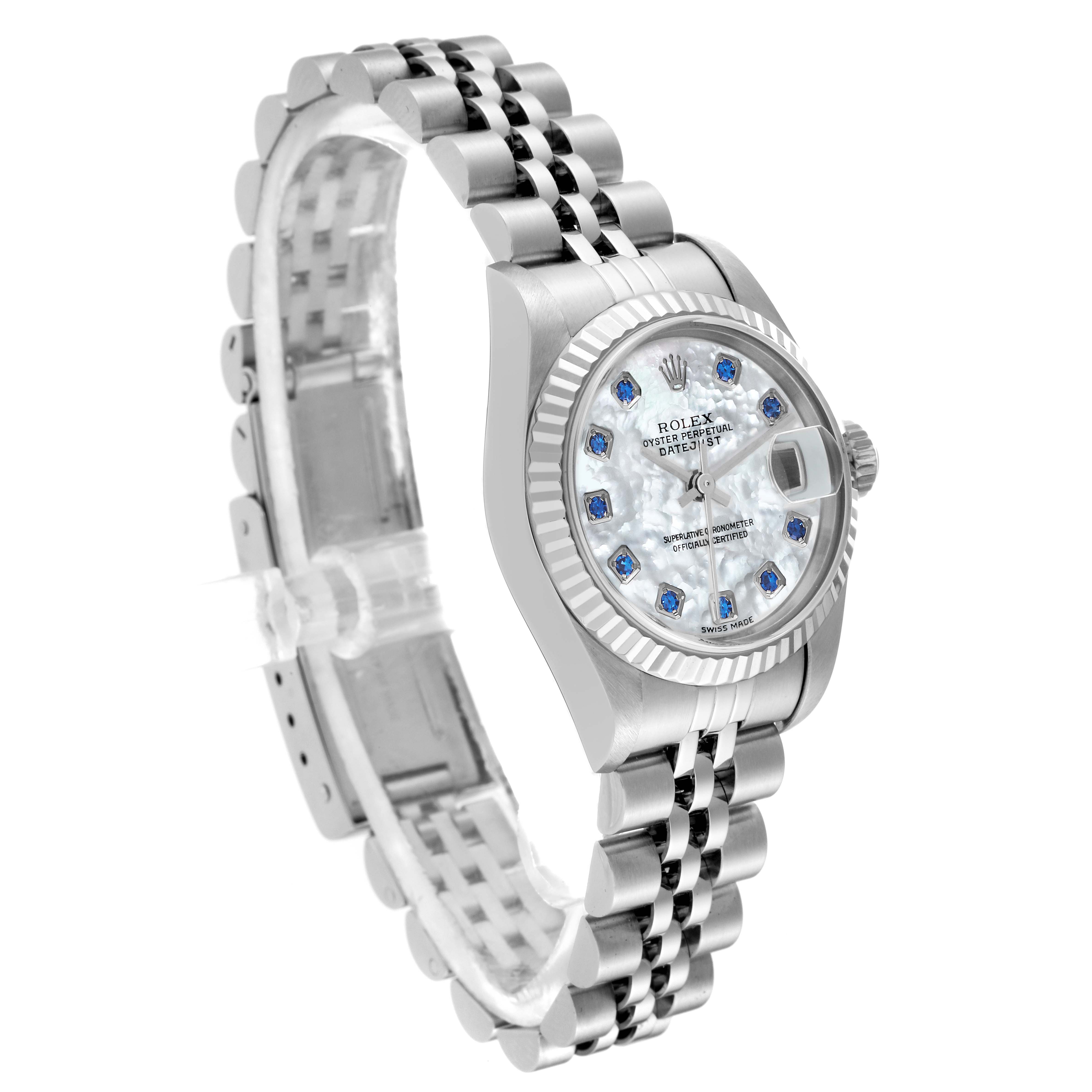 The Rolex Datejust 79174 Women
s Stainless Steel Mother of Pearl Dial 79174 Women
s Stainless Steel Mother of Pearl Dial watch is shown at an angle displaying the face, bezel, crown, and part of the strap.