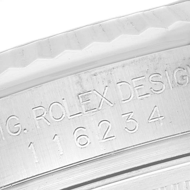 This close-up angle shows the engraved model number and "ROLEX DESIGN" text on the side of a Rolex Datejust 116234 Men's Stainless Steel Silver Dial 116234 Men's Stainless Steel Silver Dial watch case.
