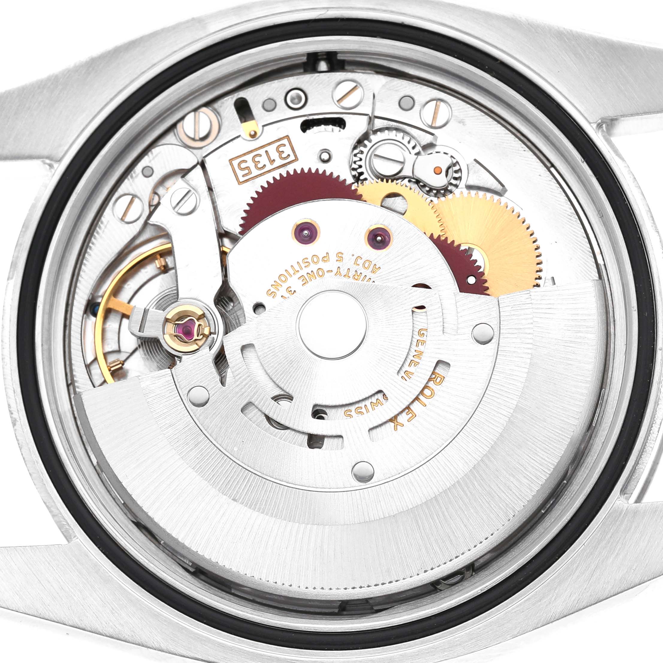 The image shows the inner movement of the Rolex Datejust 116234 Men's Stainless Steel White Dial watch, viewed from the back, highlighting its intricate mechanical components.
