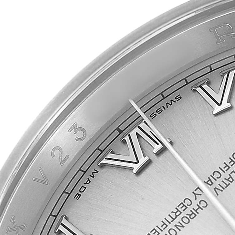 The image shows a close-up of the Roman numerals and minute markers on the Rolex Datejust 116234 Men's Stainless Steel White Dial's dial.