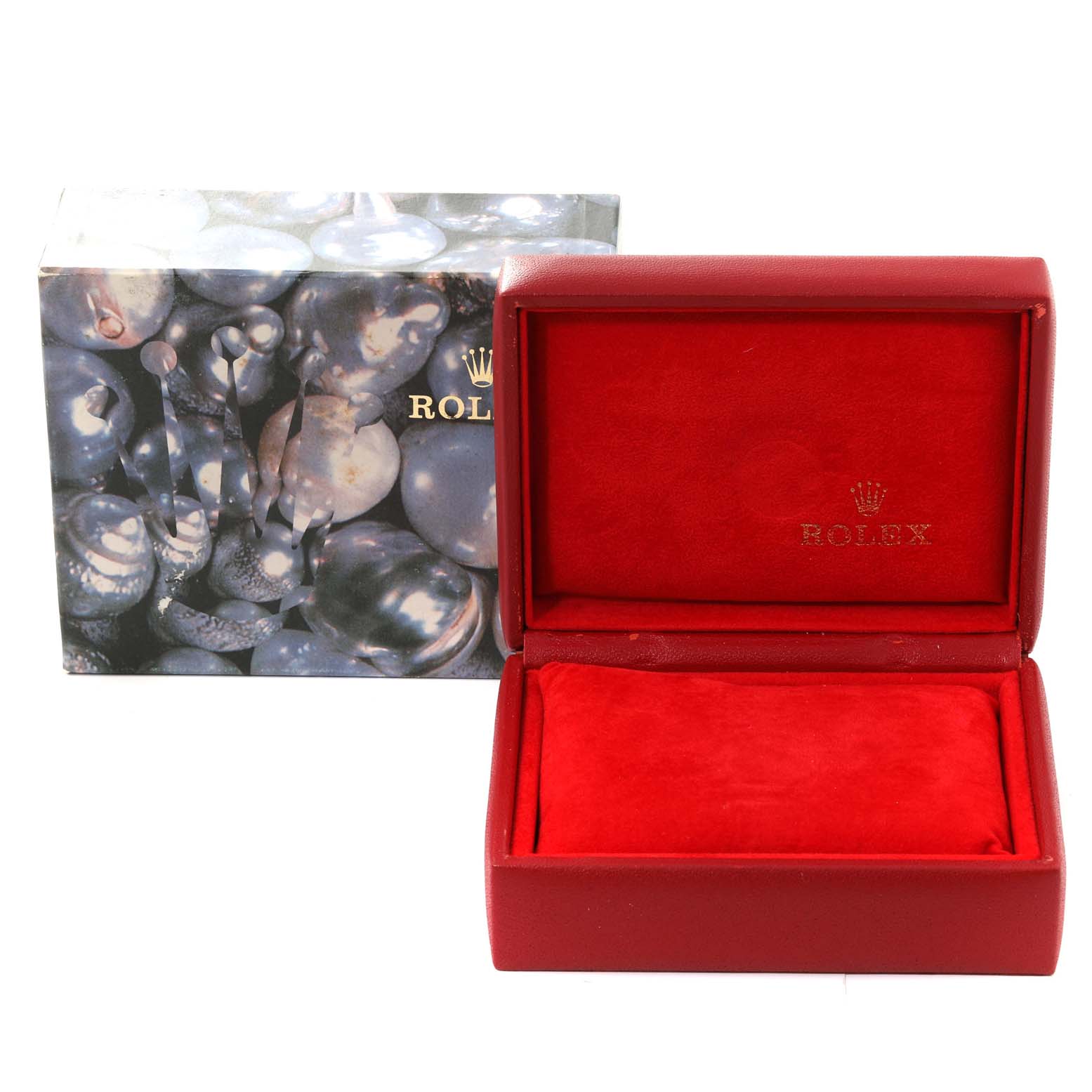 This image shows a Rolex Datejust 79173 Women's Steel and Gold (two tone) Blue Dial 79173 Women's Steel and Gold (two tone) Blue Dial watch box, open to display its red interior and outer sleeve.