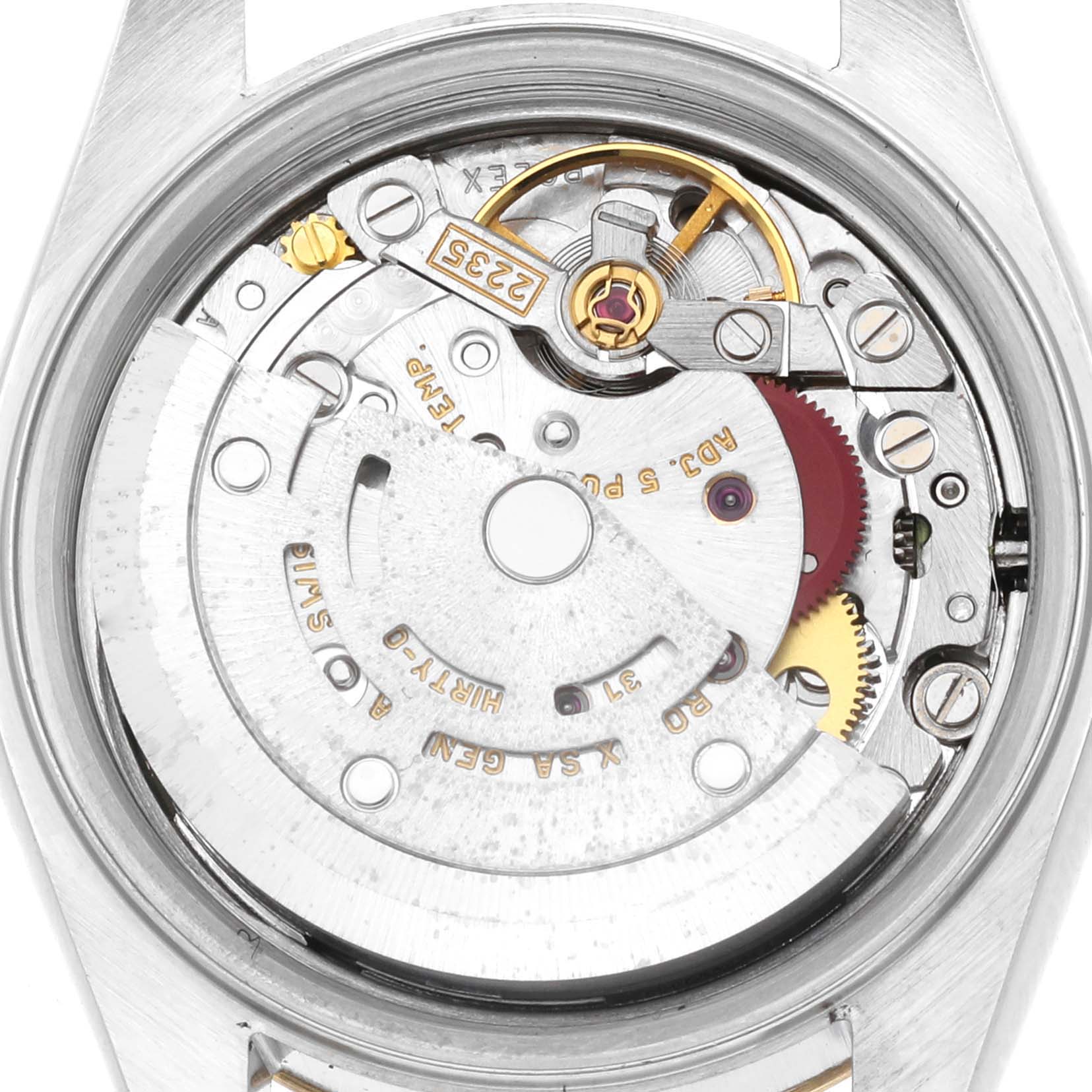 This image shows the movement mechanism of a Rolex Datejust 79173 Women's Steel and Gold (two tone) Blue Dial 79173 Women's Steel and Gold (two tone) Blue Dial watch from the back view, with visible gears and components.