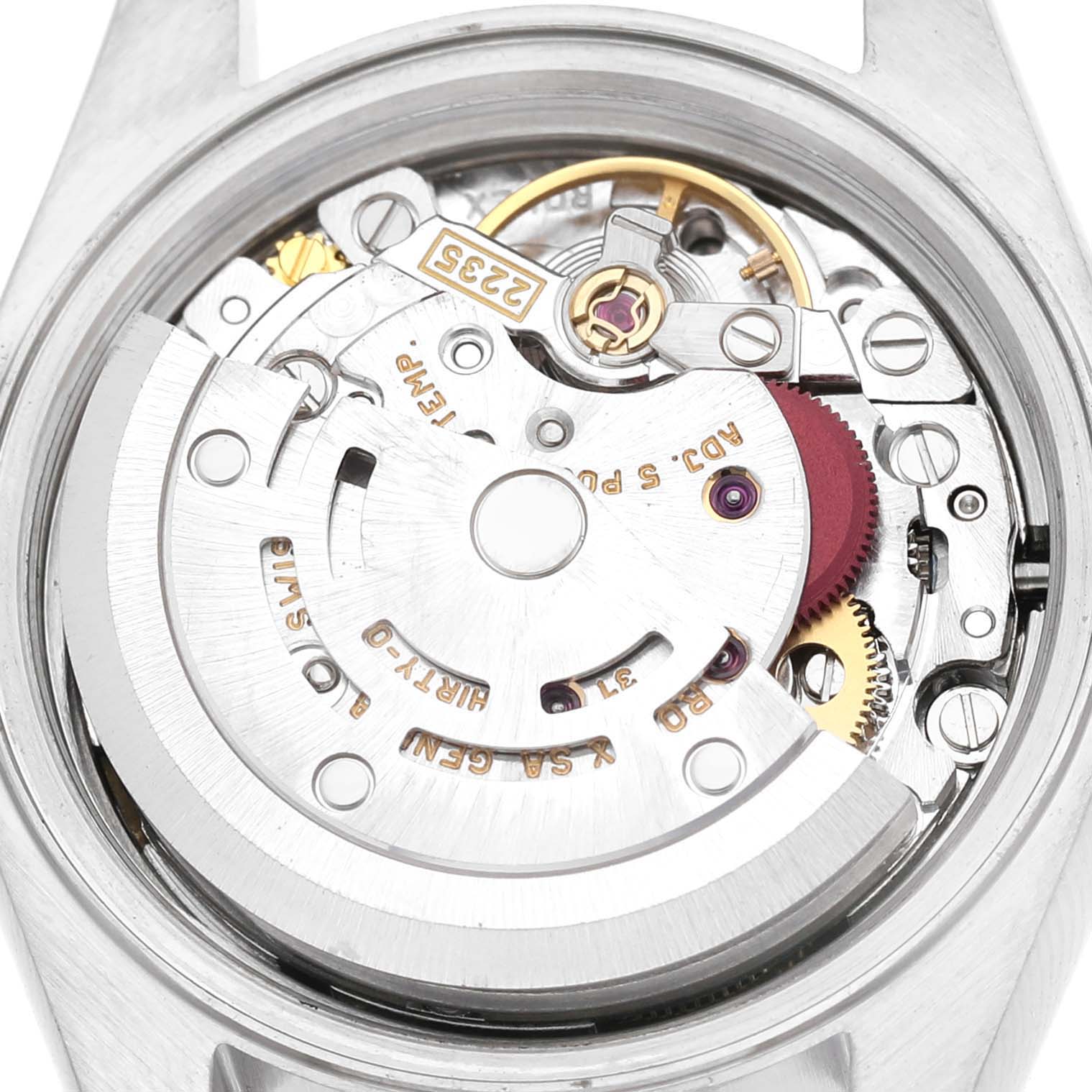 The image shows the movement from the back of a Rolex Datejust 79173 Women's Stainless Steel Champagne Dial watch, highlighting gears and the rotor.