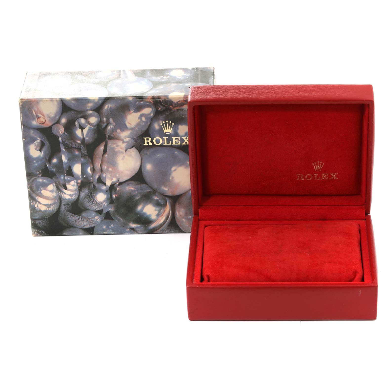 This image shows a red Rolex Datejust 69173G Women's Steel and Gold (two tone) Champagne Dial 69173G Women's Steel and Gold (two tone) Champagne Dial watch box and its outer decorative box.