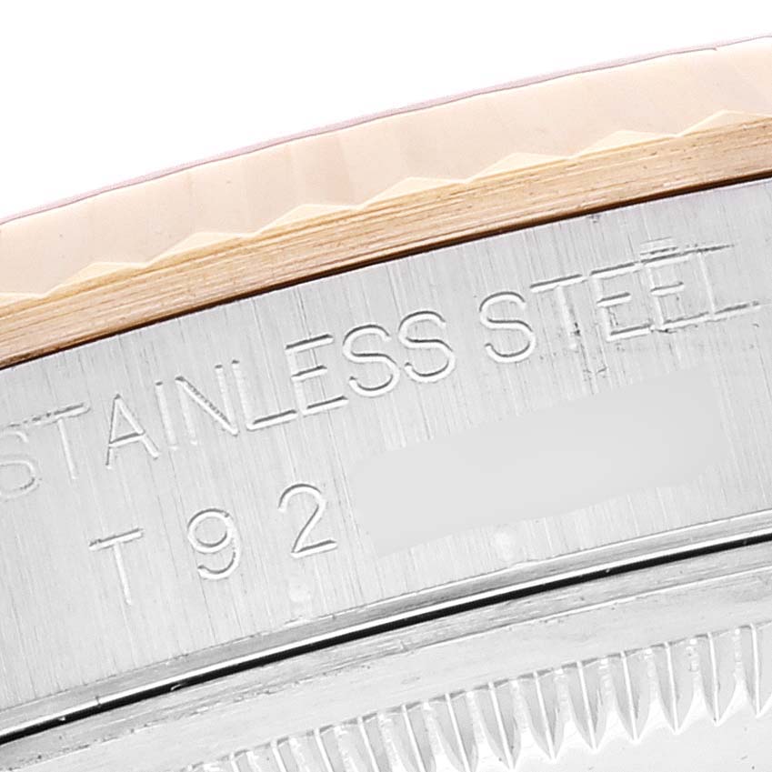 This macro shot shows the side engraving on the stainless steel case of a Rolex Datejust 16233 Men's Steel and Gold (two tone) Champagne Dial 16233 Men's Steel and Gold (two tone) Champagne Dial watch.