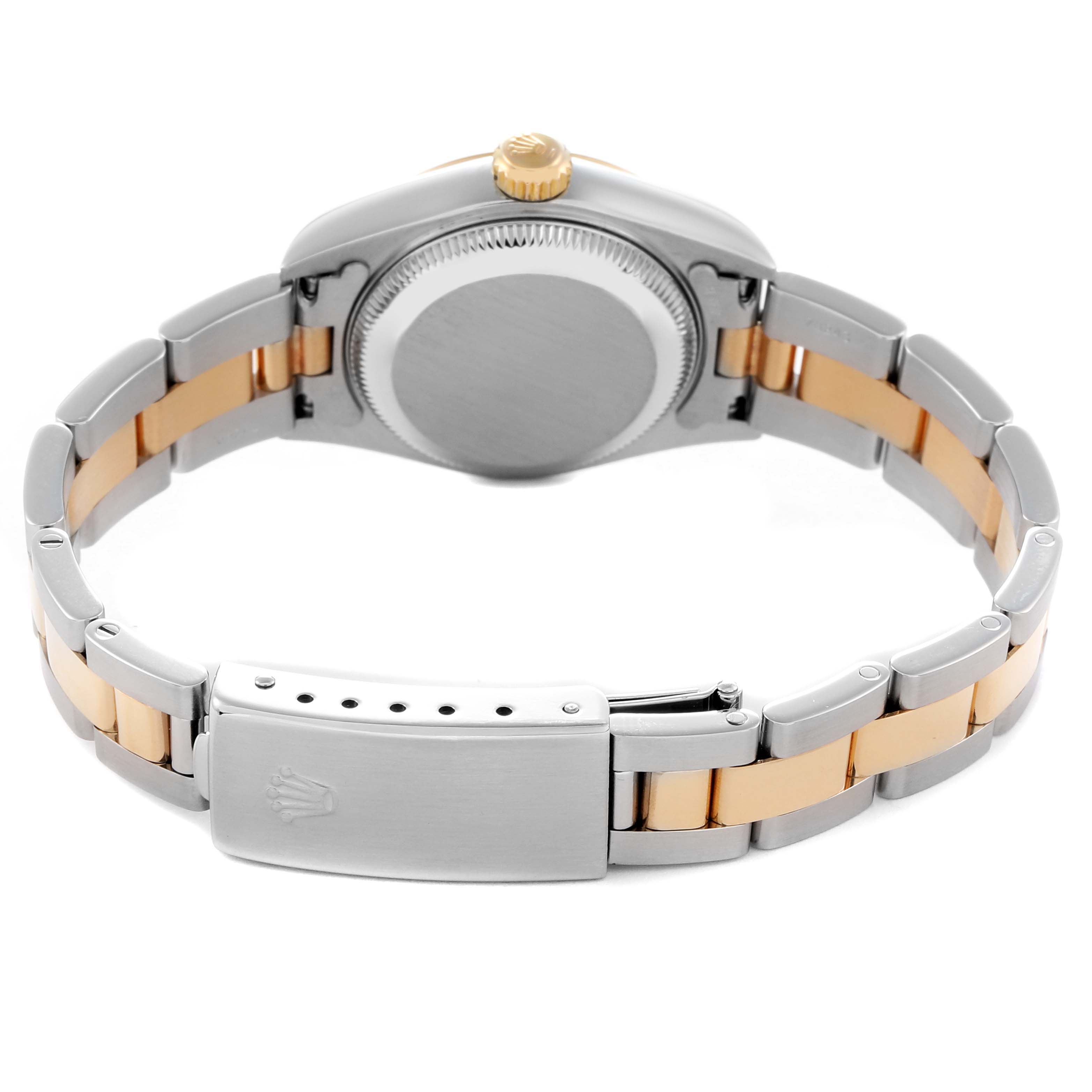 The Rolex Datejust 79163 Women
s Steel and Gold (two tone) Mother of Pearl Dial 79163 Women
s Steel and Gold (two tone) Mother of Pearl Dial watch is shown from the back, highlighting the case, bracelet, and clasp.