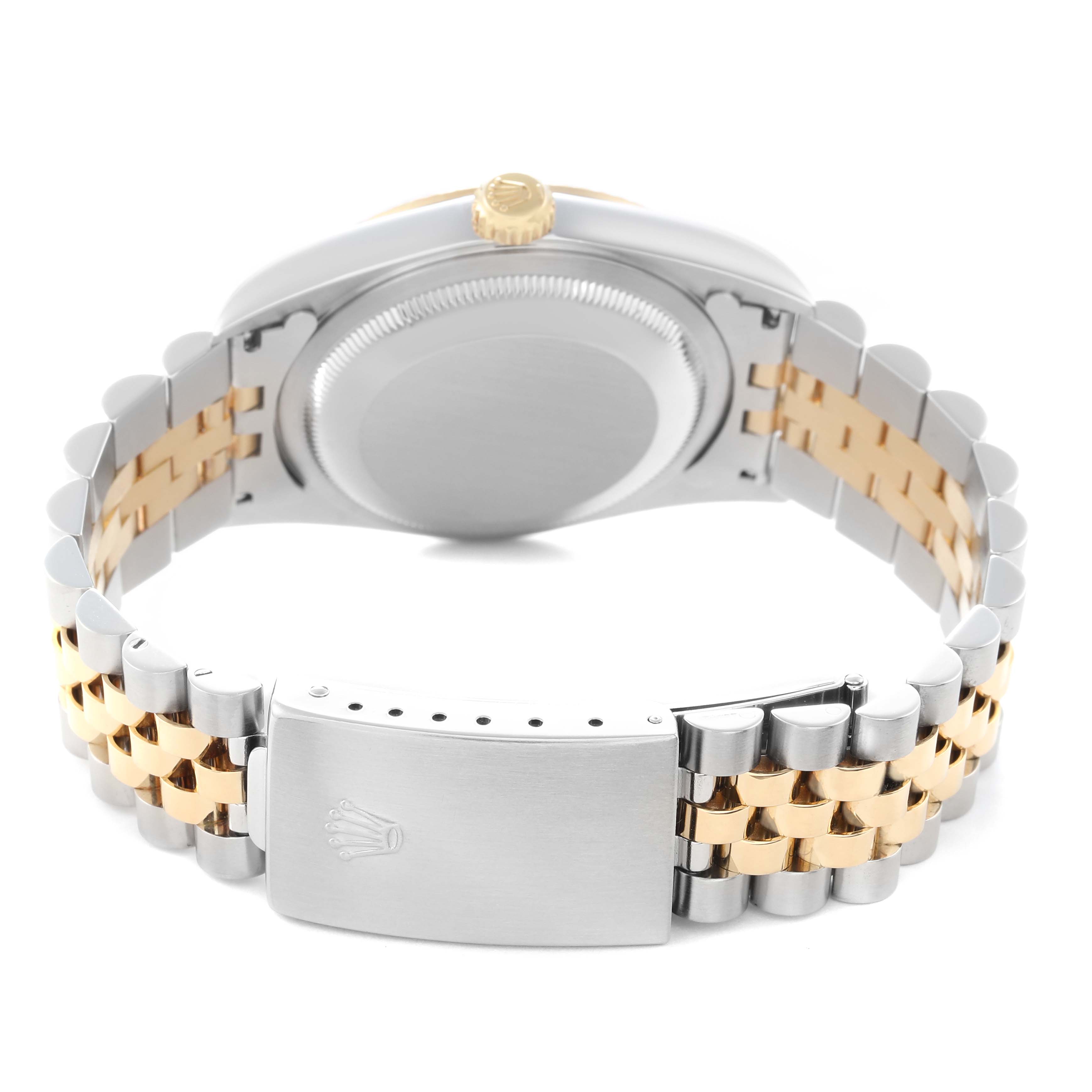 The Rolex Datejust 16233 Men
s Steel and Gold (two tone) Silver Dial 16233 Men
s Steel and Gold (two tone) Silver Dial is shown from the rear angle, highlighting the case back, crown, and metal bracelet with a clasp.