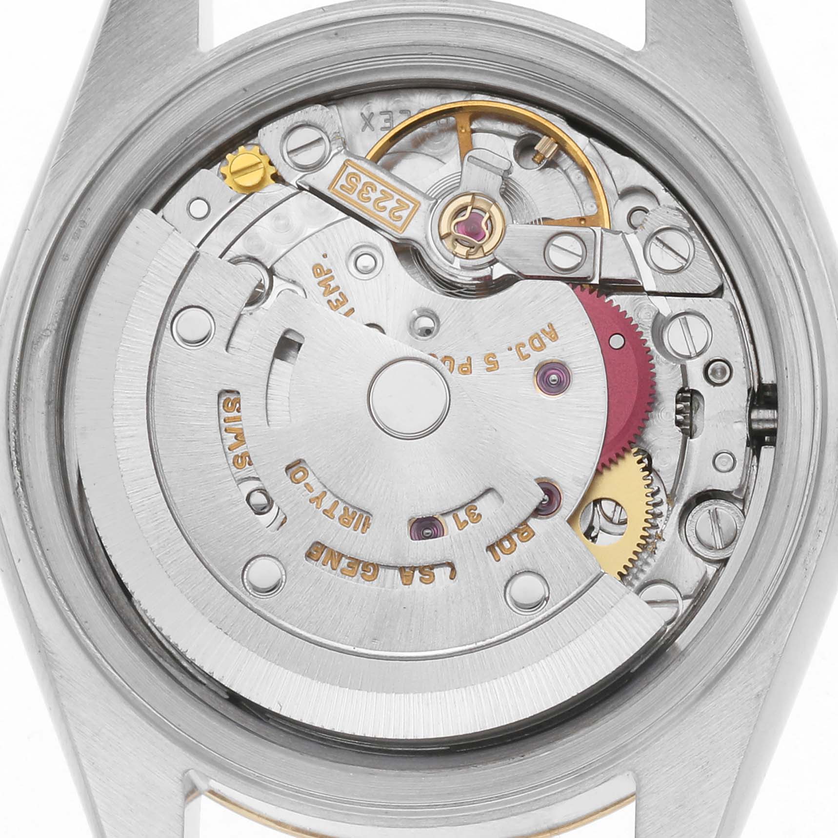The image shows the movement of a Rolex Datejust 79173 Women
s Steel and Gold (two tone) Silver Dial 79173 Women
s Steel and Gold (two tone) Silver Dial, viewed from the back, displaying components like the rotor and gears.