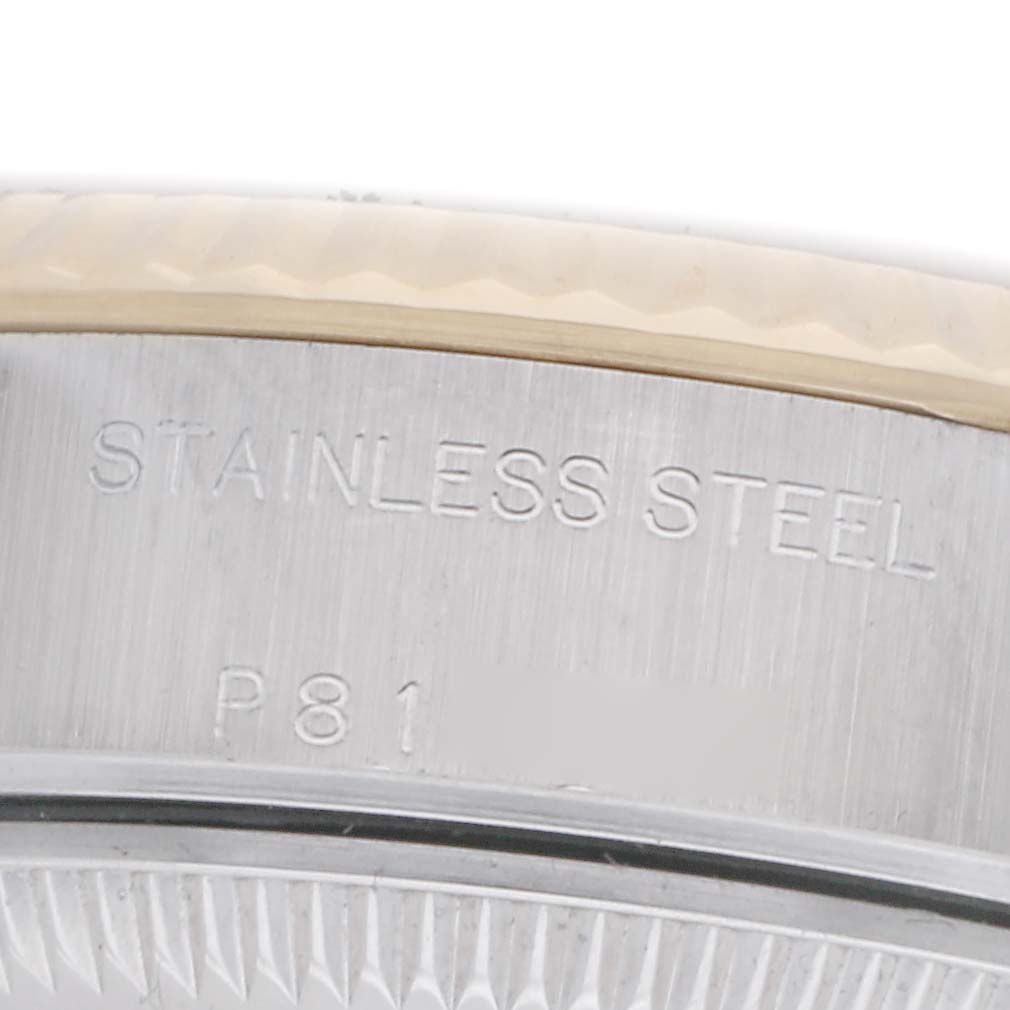 The image shows a close-up of the case back with "STAINLESS STEEL" engraving on the Rolex Datejust 79173 Women
s Steel and Gold (two tone) Silver Dial 79173 Women
s Steel and Gold (two tone) Silver Dial watch.