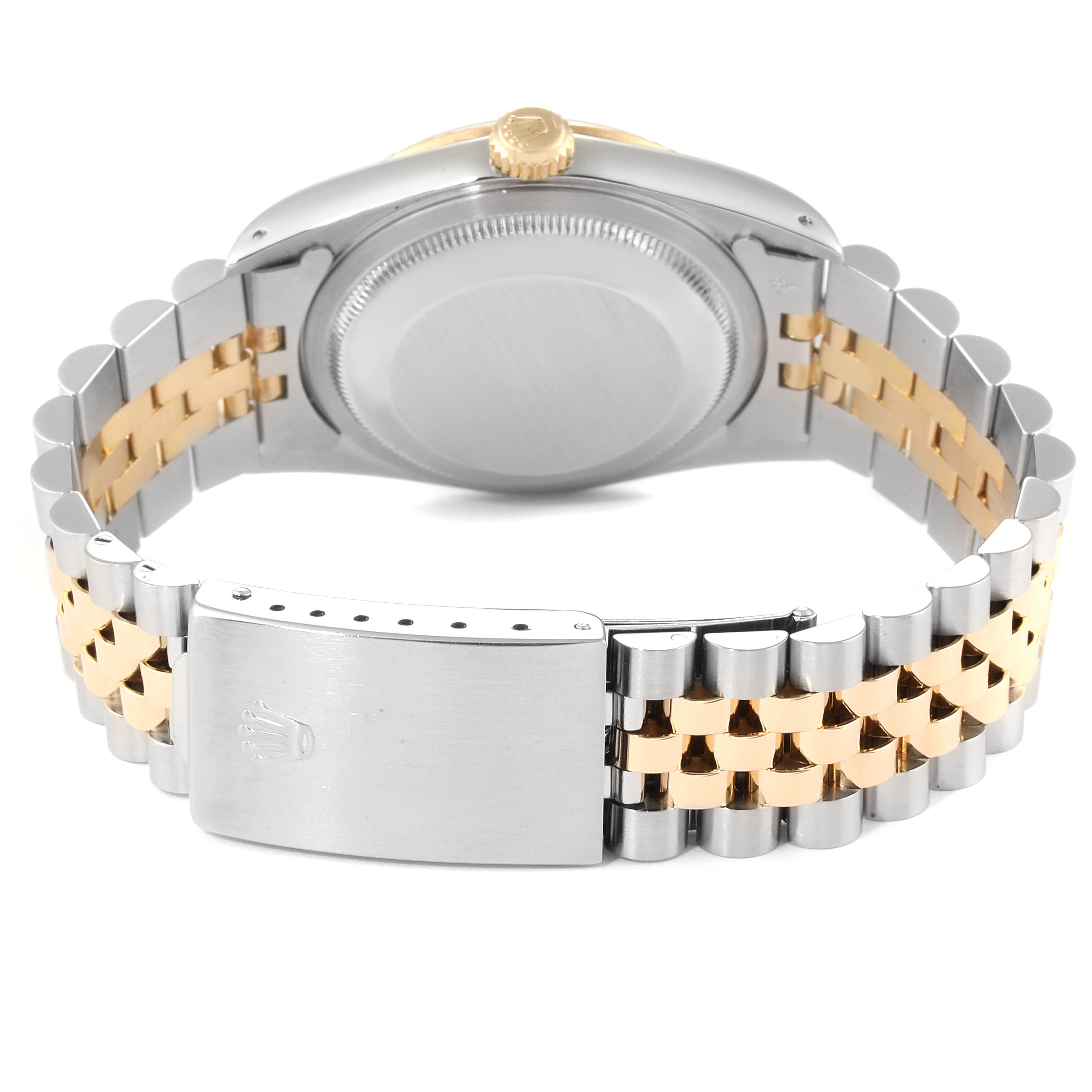 The image shows the back view of a Rolex Datejust 16233 Men
s Steel and Gold (two tone) Grey Dial 16233 Men
s Steel and Gold (two tone) Grey Dial watch, highlighting its case, crown, and two-tone metal bracelet.