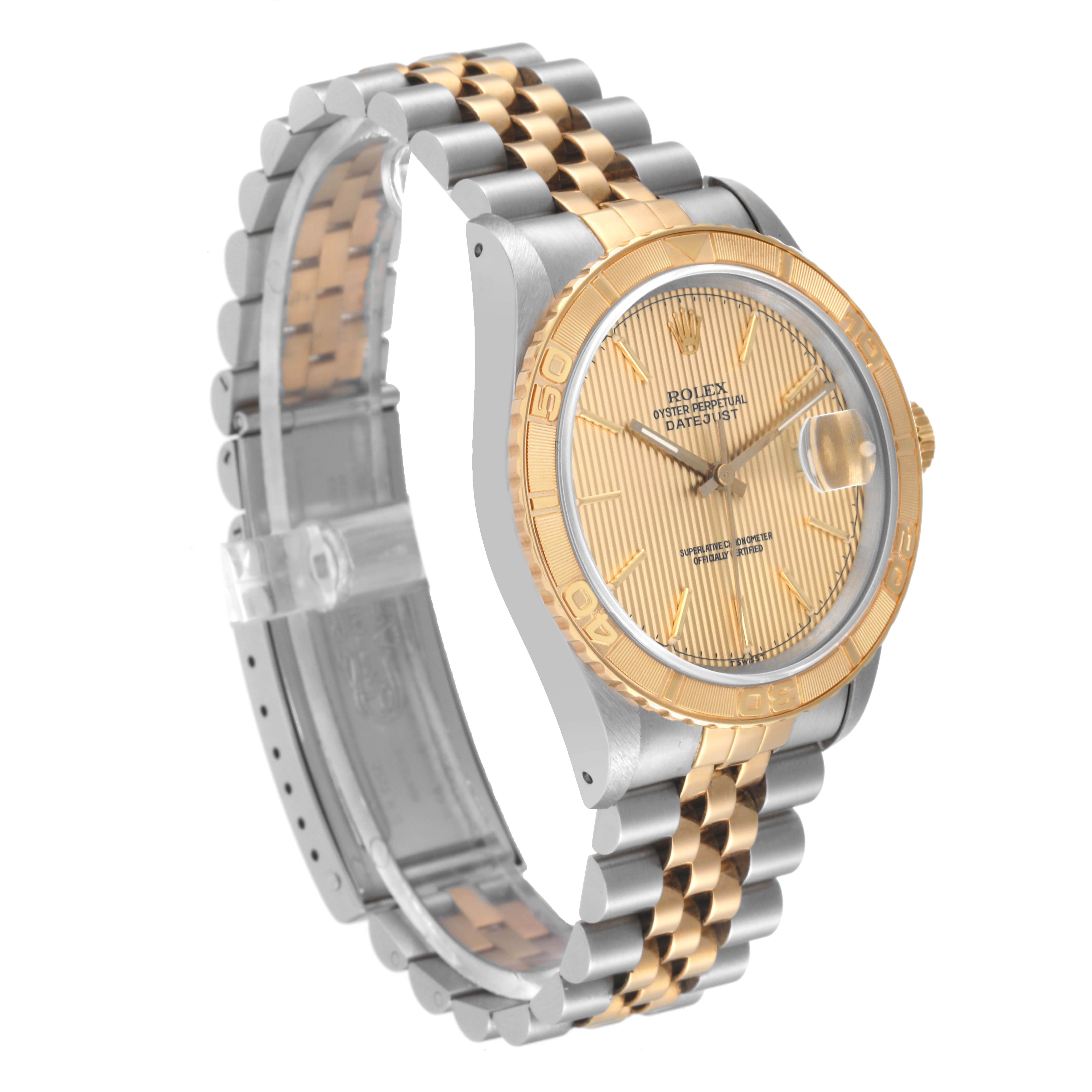 The image shows a side angle of the Rolex Turn-o-Graph 16263 Men's Steel and Gold (two tone) Champagne Dial 16263 Men's Steel and Gold (two tone) Champagne Dial watch, highlighting its two-tone bracelet, bezel, and dial.