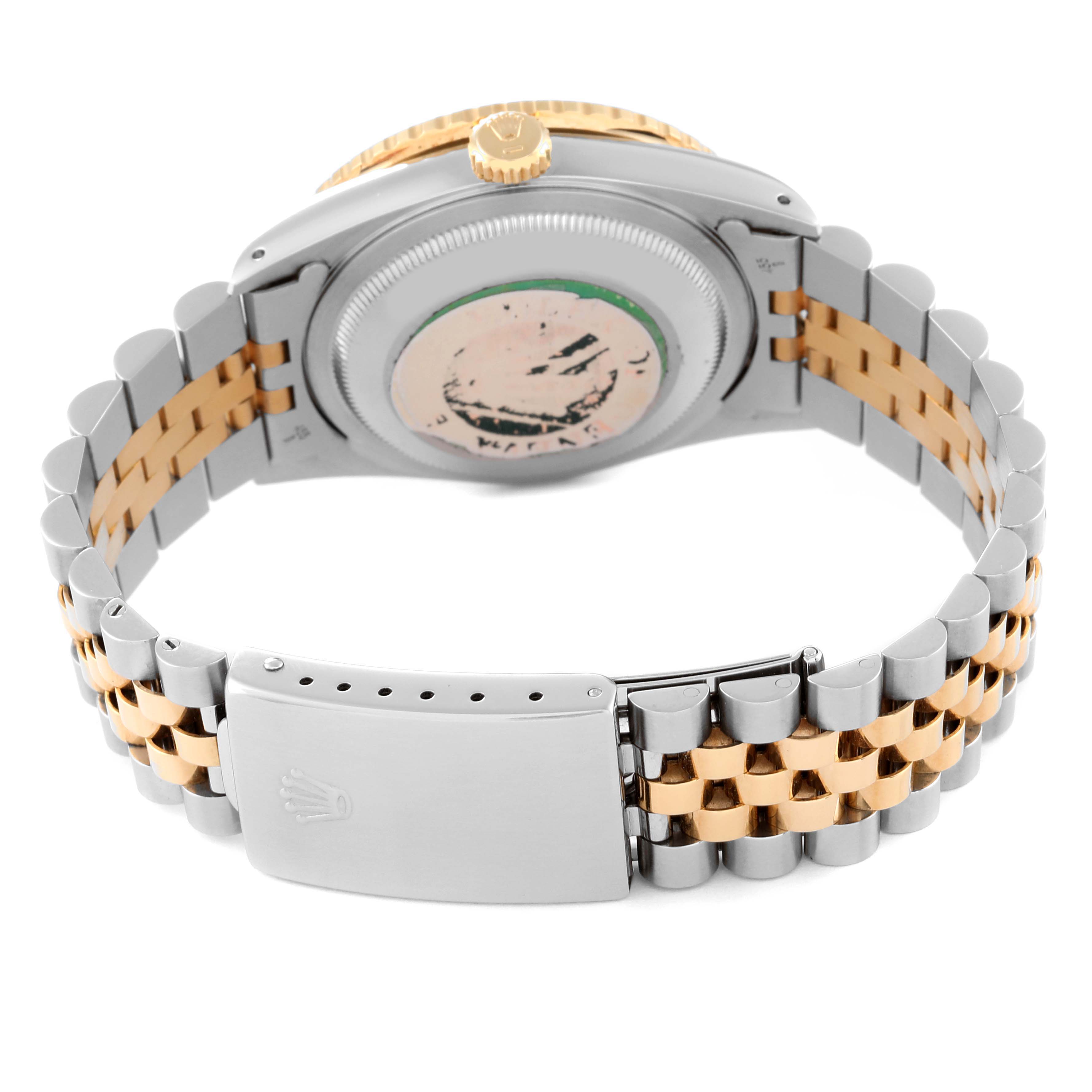 This image shows the back case and bracelet of a Rolex Turn-o-Graph 16263 Men's Steel and Gold (two tone) Champagne Dial 16263 Men's Steel and Gold (two tone) Champagne Dial watch, focusing on the clasp and golden crown.