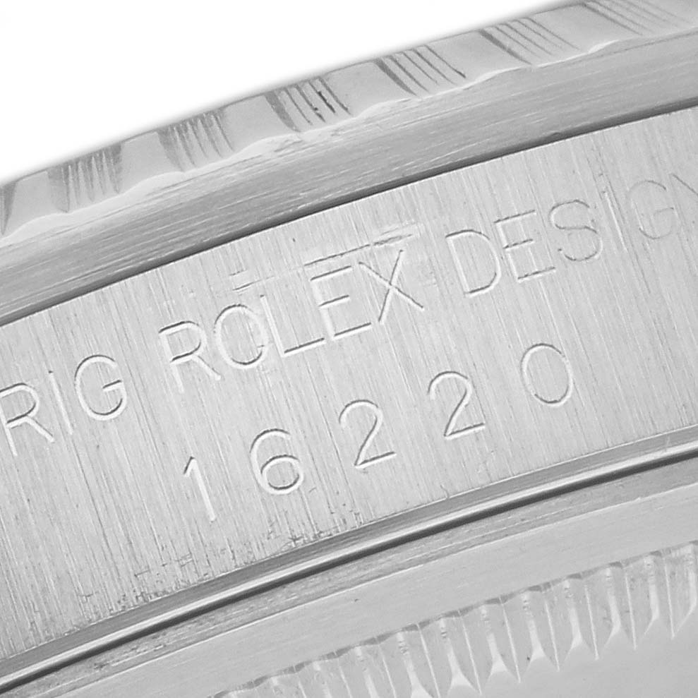 The image shows an engraved side view of the case of a Rolex Datejust 16220 Men
s Stainless Steel White Dial 16220 Men
s Stainless Steel White Dial model, highlighting the model number and branding.