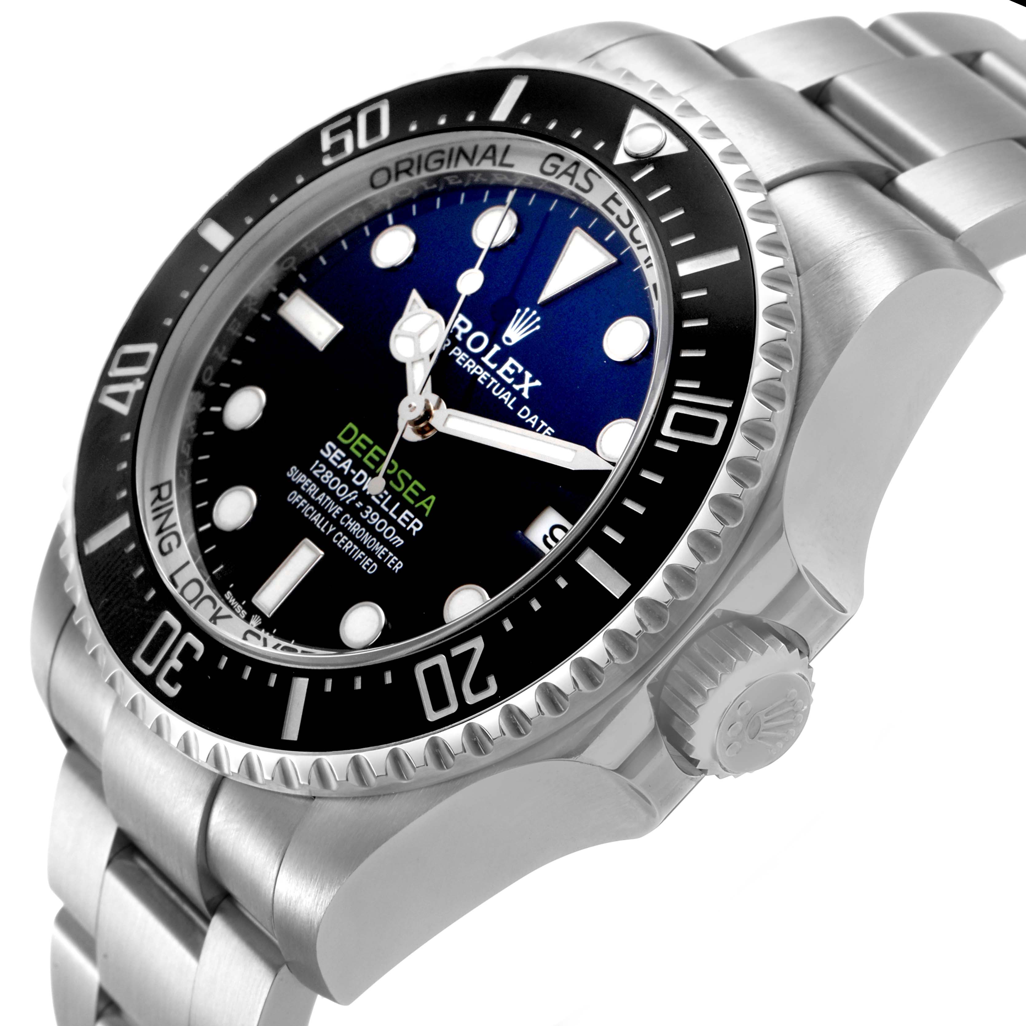 The Rolex Sea-Dweller 136660 Men's Stainless Steel Blue Dial watch is shown at a slight angled profile, highlighting the bezel, crown, and bracelet.