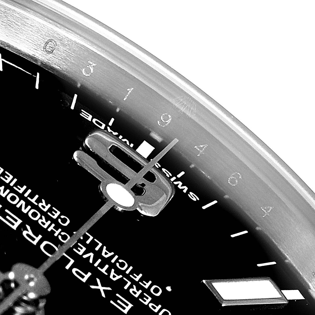 The image shows a close-up of the dial and hands of a Rolex Explorer 214270 Men
s Stainless Steel Black Dial 214270 Men
s Stainless Steel Black Dial watch at an angled perspective.