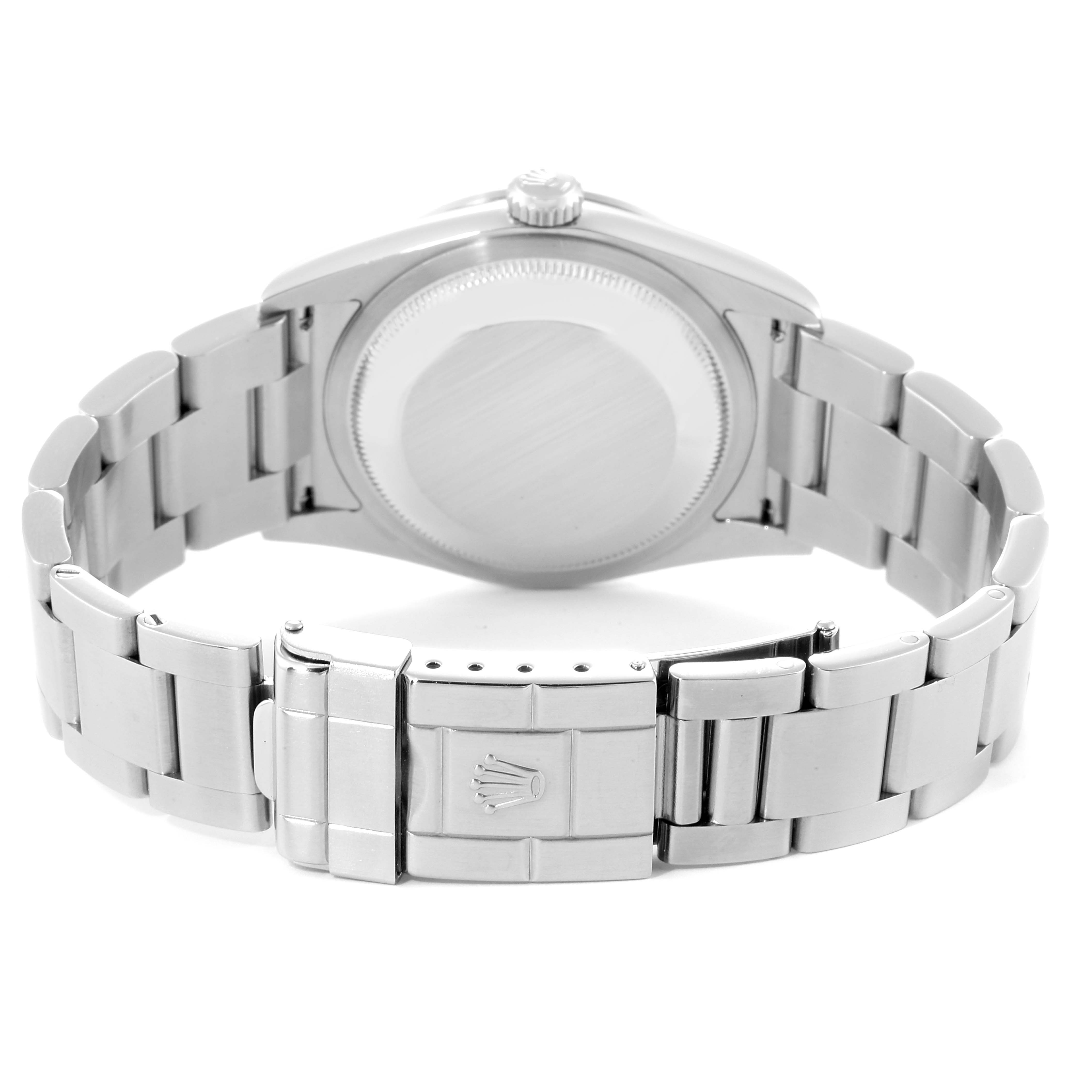 The image shows the back view of a Rolex Explorer 114270 Men
s Stainless Steel Black Dial 114270 Men
s Stainless Steel Black Dial watch, highlighting the bracelet and the clasp featuring the Rolex logo.