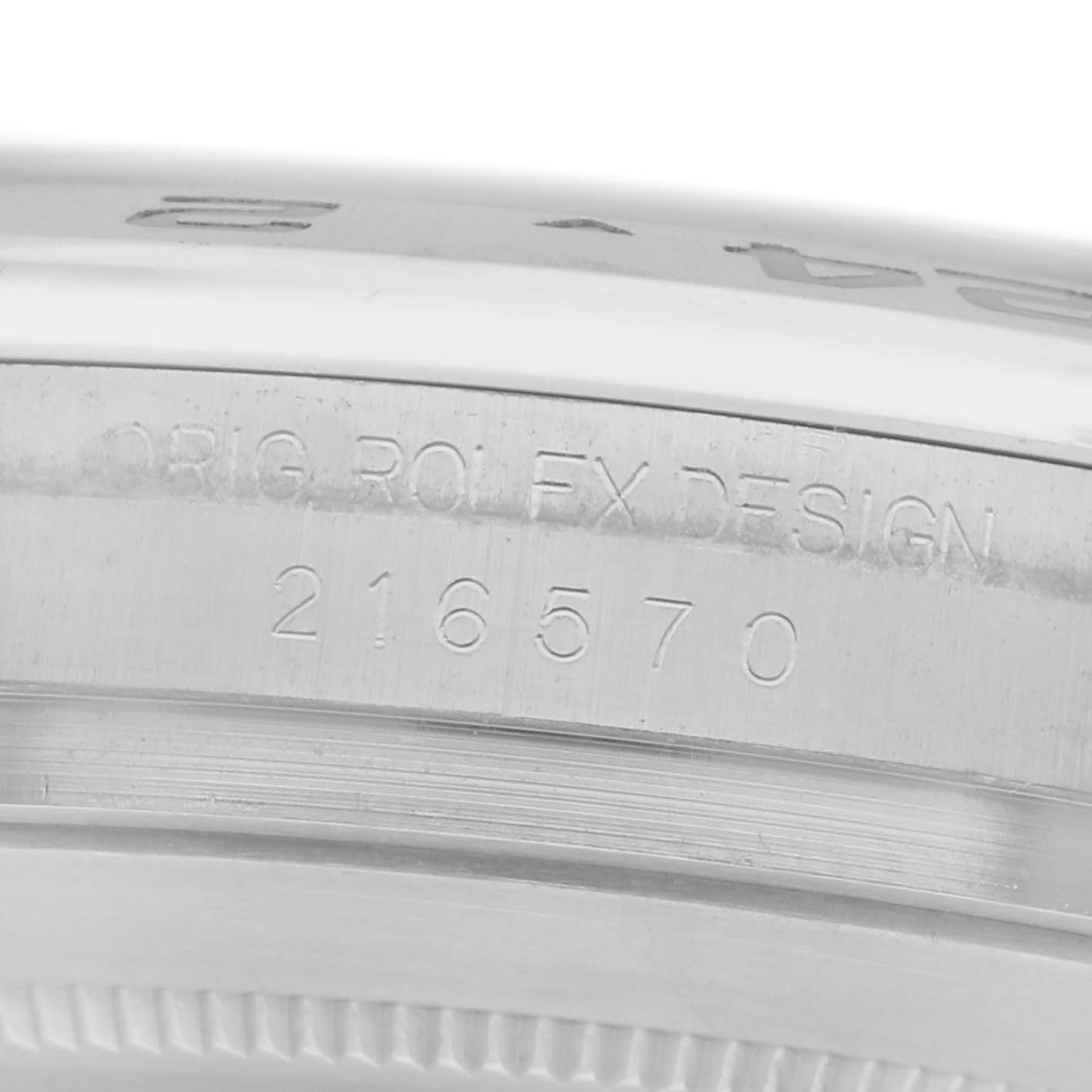 The image shows a close-up side view of the Rolex Explorer 216570 Men
s Stainless Steel Black Dial 216570 Men
s Stainless Steel Black Dial model, highlighting the engraved model number and design details on the case.