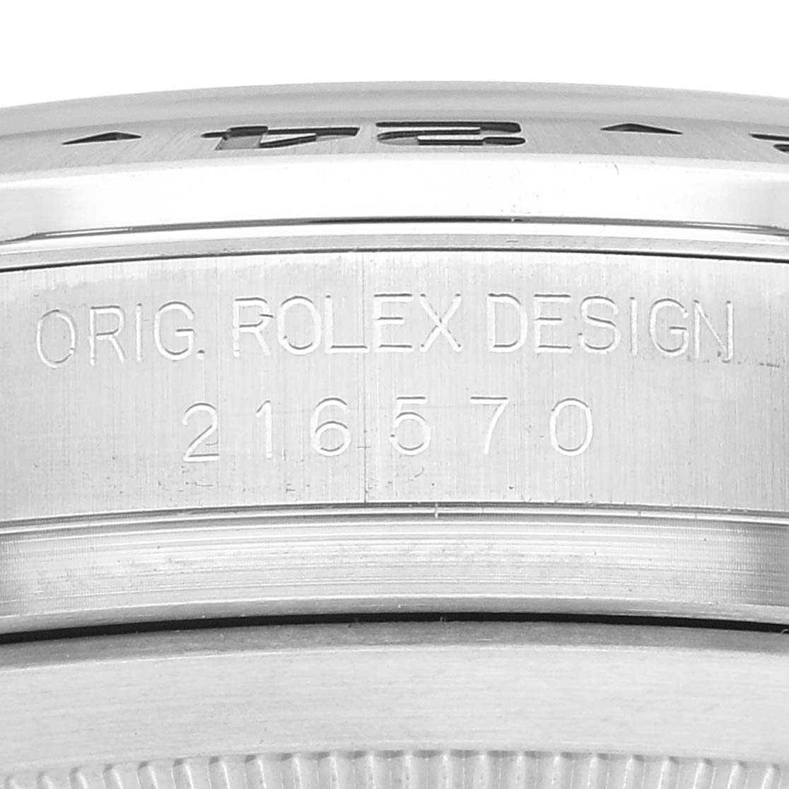 This image shows a close-up of the case side and serial number engraving on a Rolex Explorer 216570 Men
s Stainless Steel White Dial 216570 Men
s Stainless Steel White Dial watch.