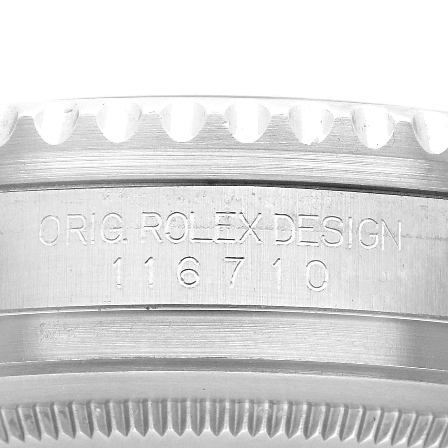 Close-up of the side of a Rolex GMT-Master 116710LN Men
s Stainless Steel Black Dial 116710LN Men
s Stainless Steel Black Dial watch showing "ORIG. ROLEX DESIGN" and model number 116710.