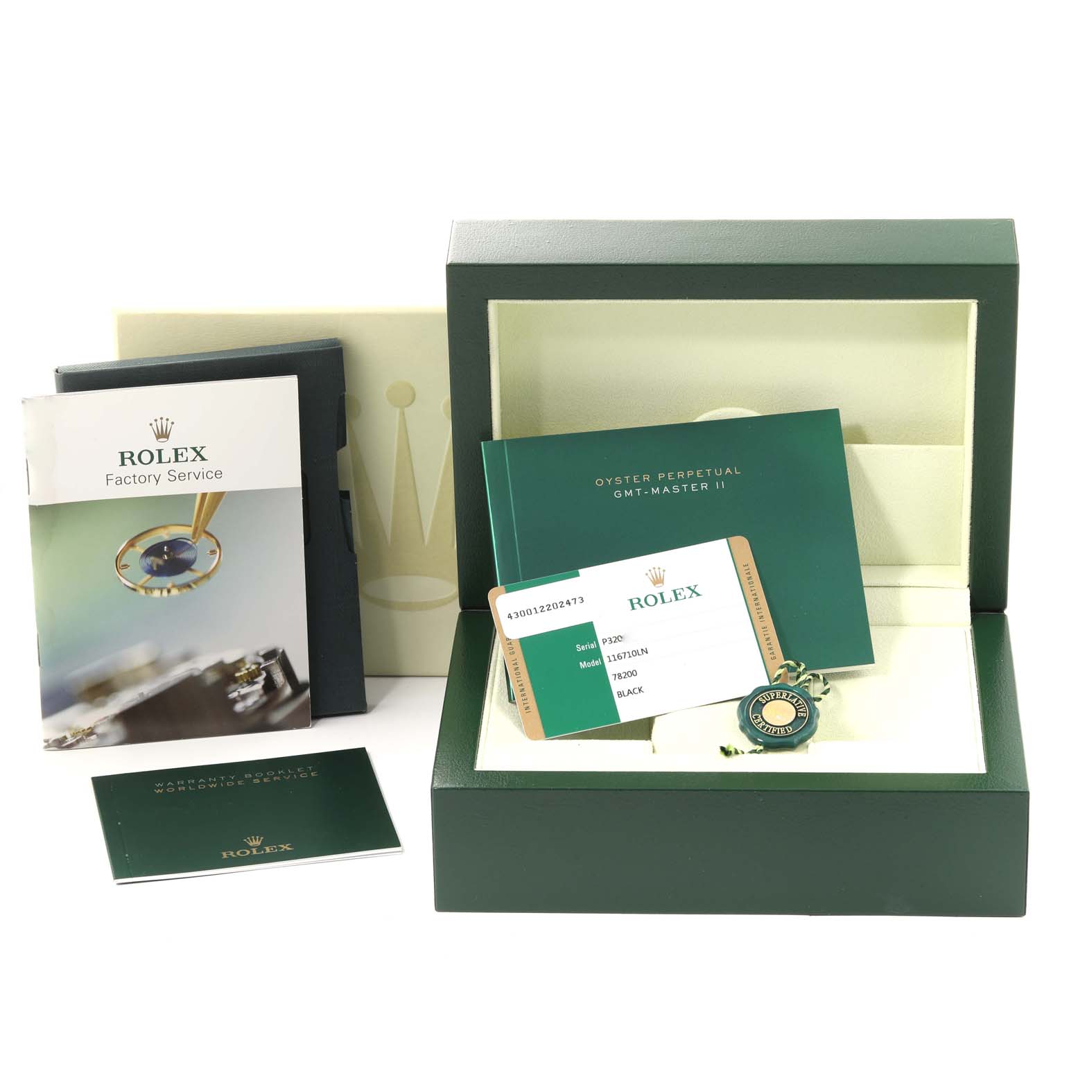 The image shows the accessories for a Rolex GMT-Master 116710LN Men
s Stainless Steel Black Dial 116710LN Men
s Stainless Steel Black Dial watch, including the box, warranty card, manuals, and a tag.