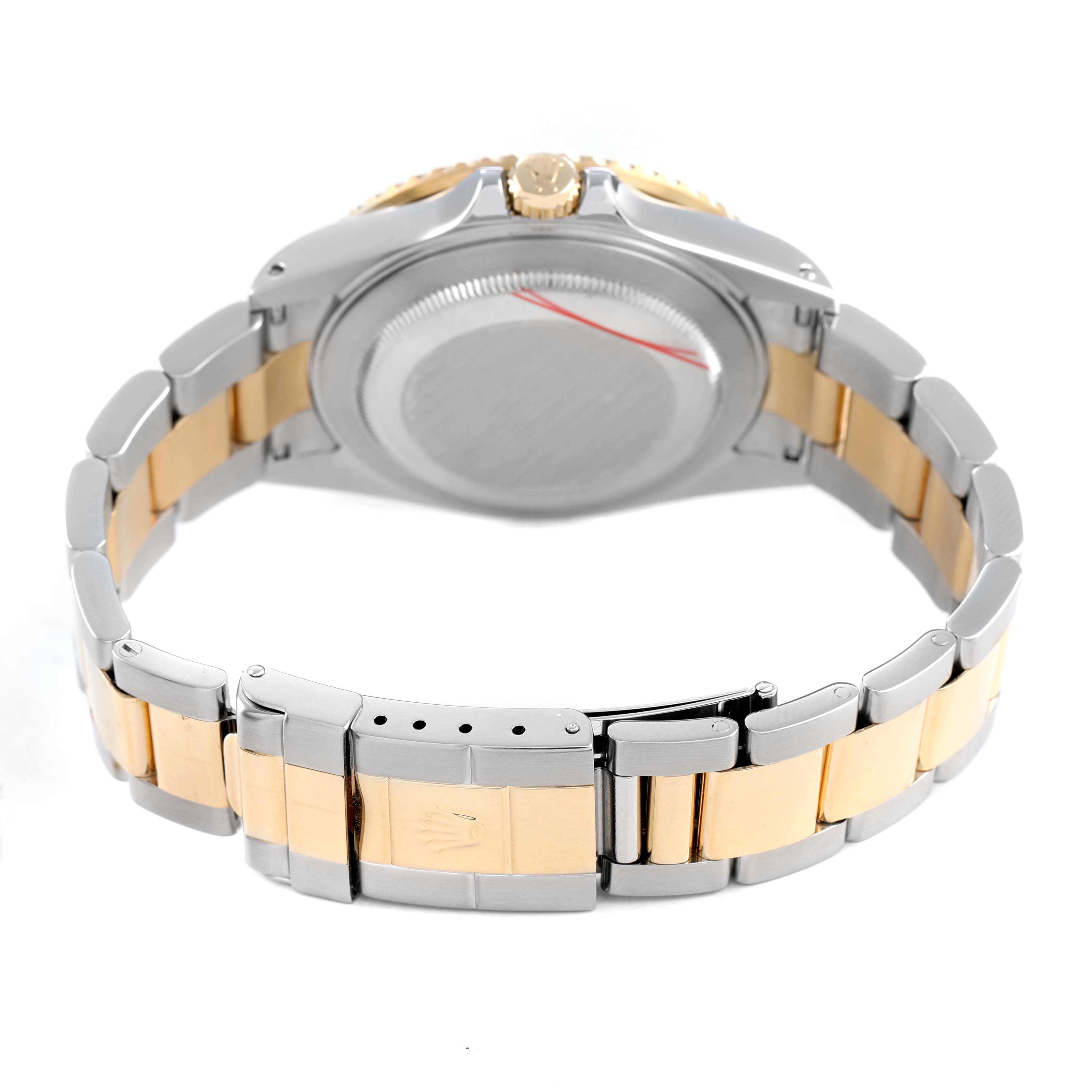 The image shows the back of a Rolex GMT-Master 16713 Men's Stainless Steel Black Dial watch, highlighting its case, crown, and two-tone bracelet with clasp.