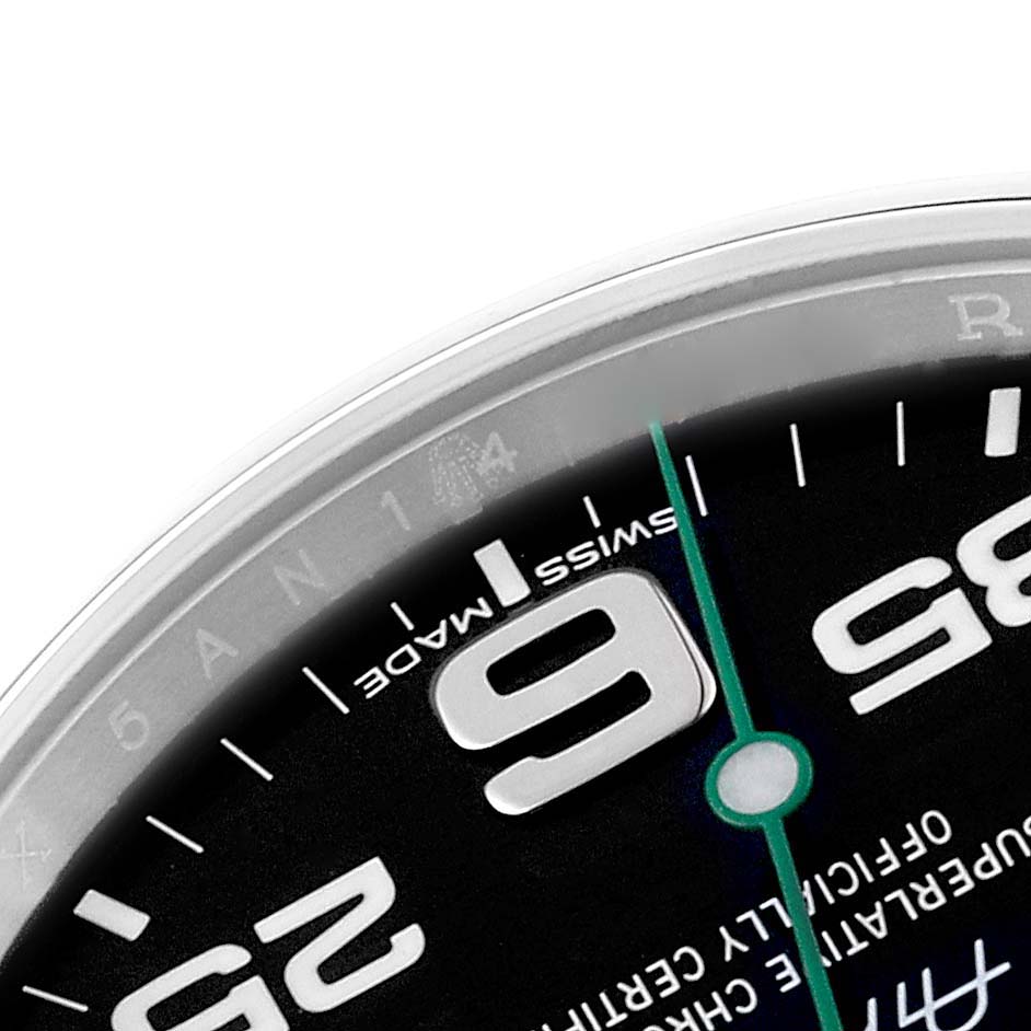 This image shows a close-up view of the face of a Rolex Air-King 116900 Men's Stainless Steel Black Dial 116900 Men's Stainless Steel Black Dial watch, focusing on partial numerals and the "Swiss Made" marking.
