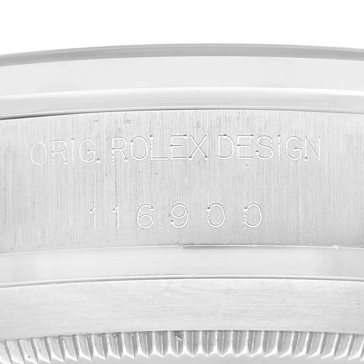 The image shows an engraving on the side of the bezel and caseback of a Rolex Air-King 116900 Men's Stainless Steel Black Dial 116900 Men's Stainless Steel Black Dial watch model 116900.