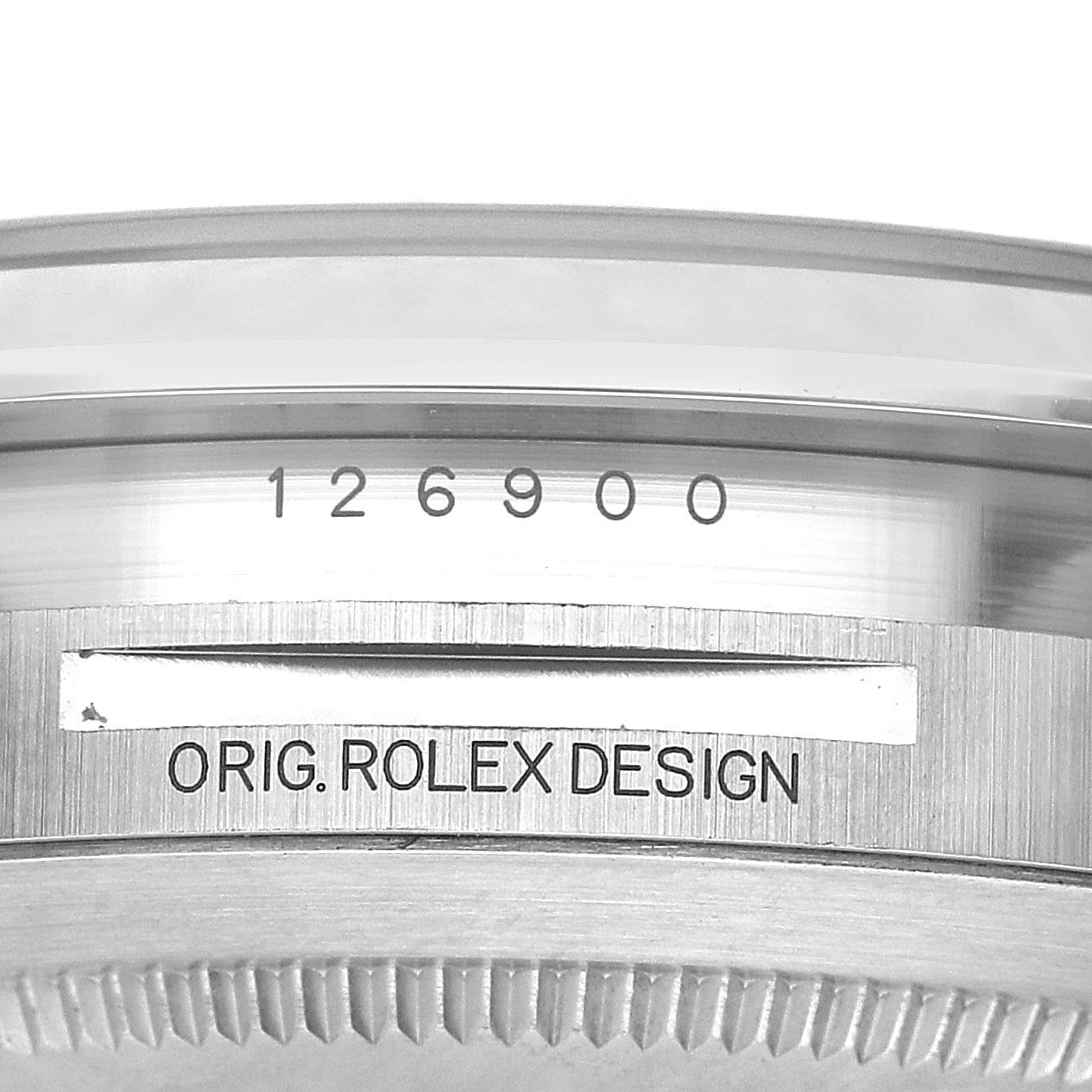 The image shows a close-up of the case edge of an Air-King by Rolex, featuring the model number and "ORIG. ROLEX DESIGN."