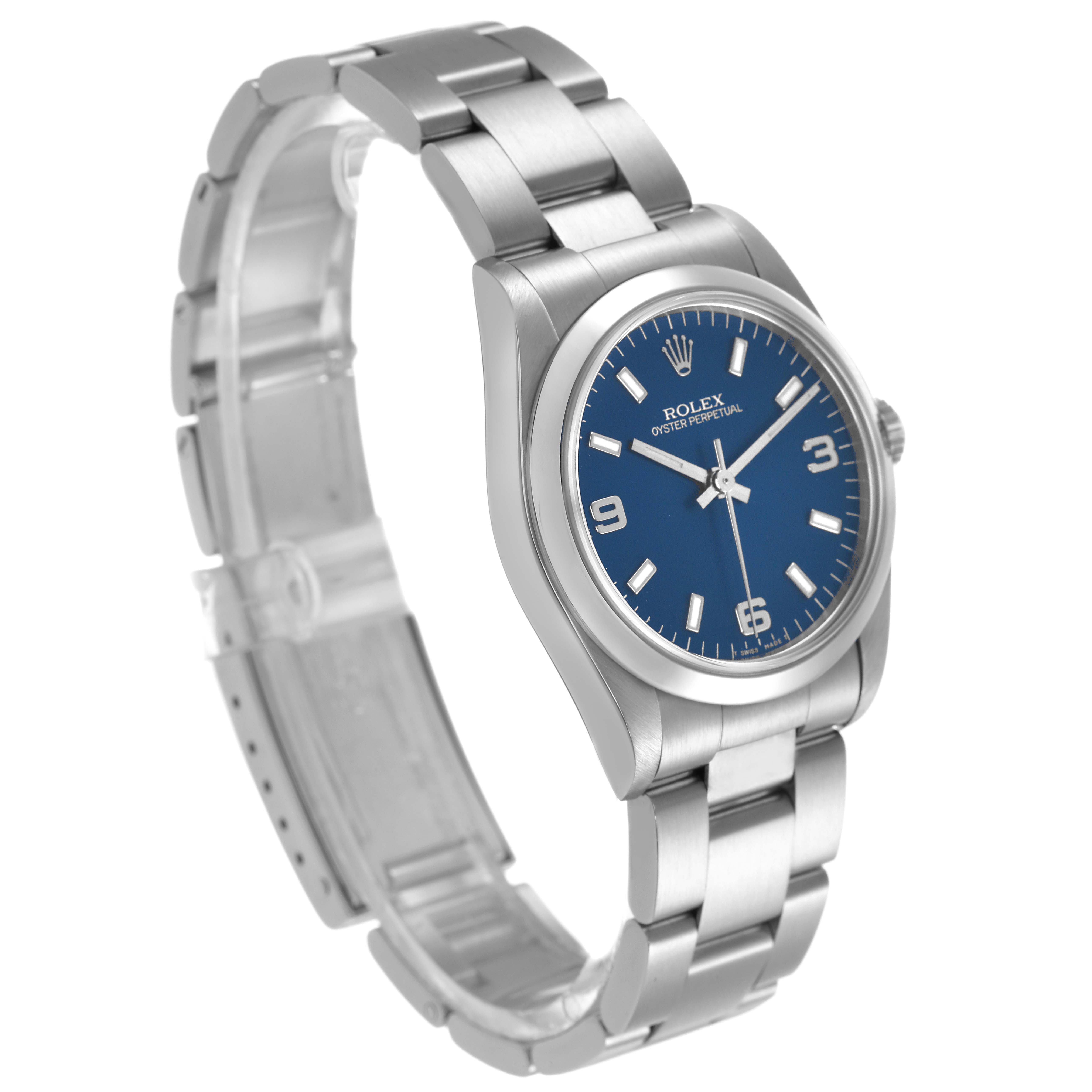 The Rolex Mid-Size 67480 Women's Stainless Steel Blue Dial watch is shown from a high angle, displaying its blue dial, case, bezel, and bracelet.