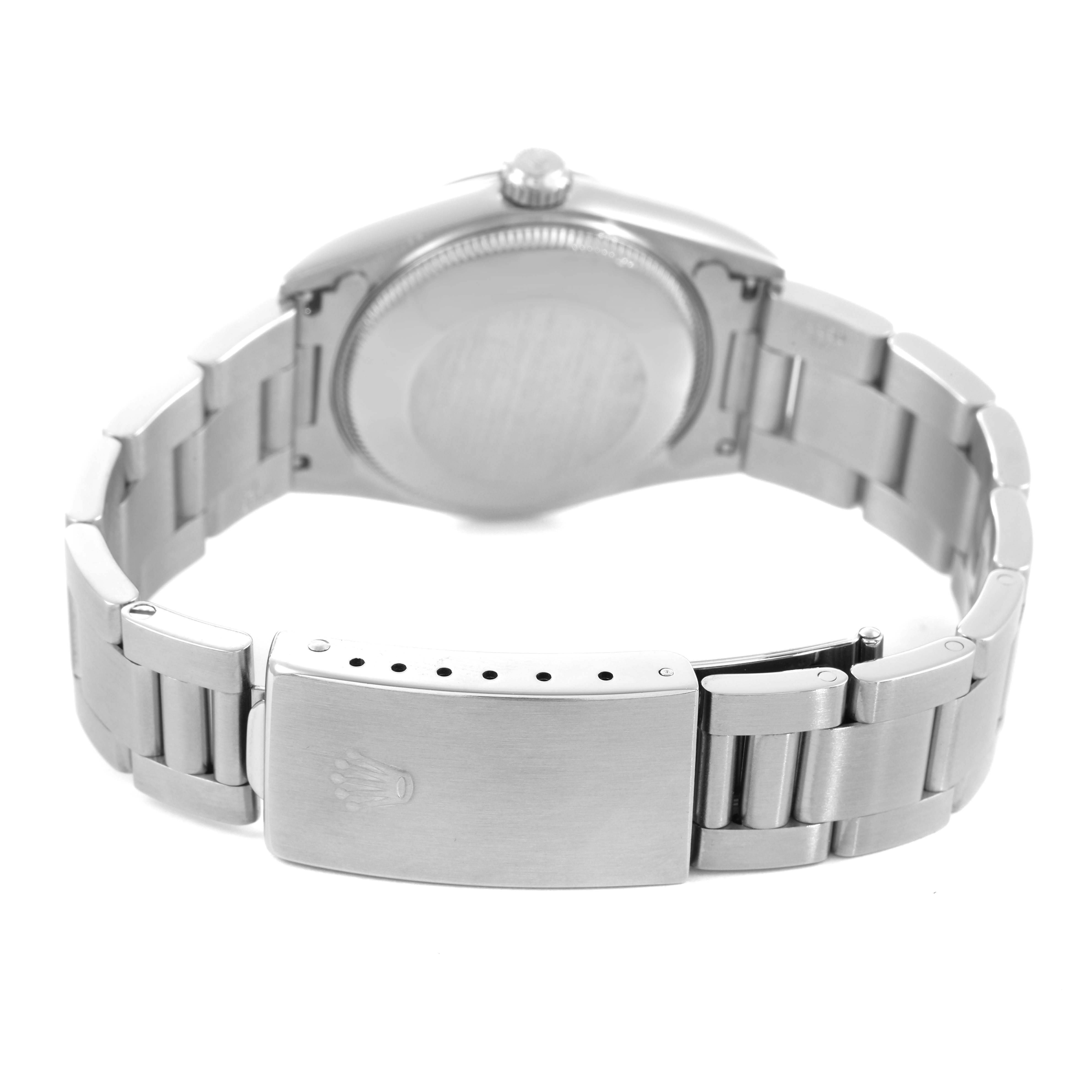 The image shows the Rolex Mid-Size 67480 Women's Stainless Steel Blue Dial watch from the rear, highlighting the clasp, bracelet, and case back.