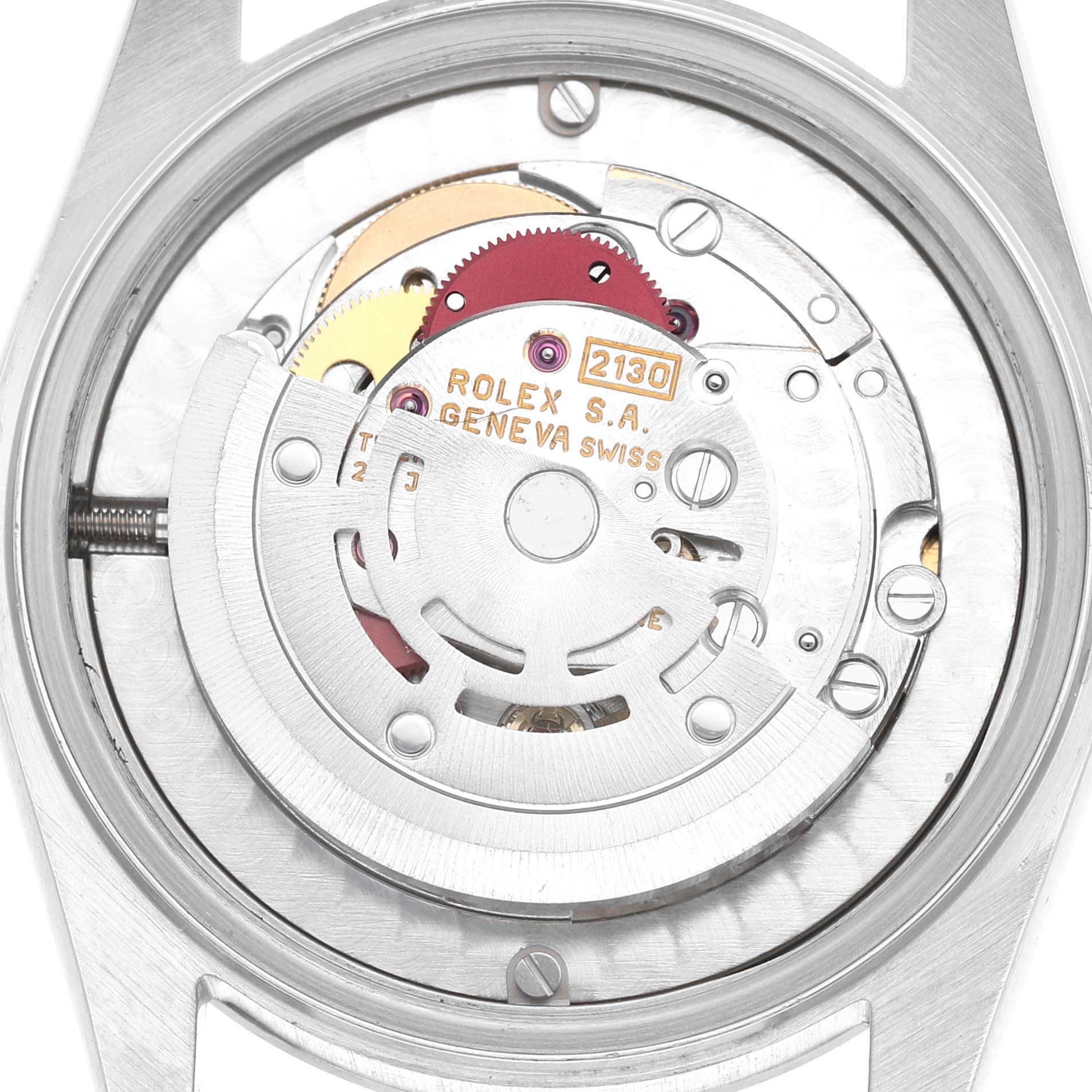 The image shows the movement of a Rolex Mid-Size 67480 Women's Stainless Steel Blue Dial watch from a rear angle, highlighting gears and the rotor.