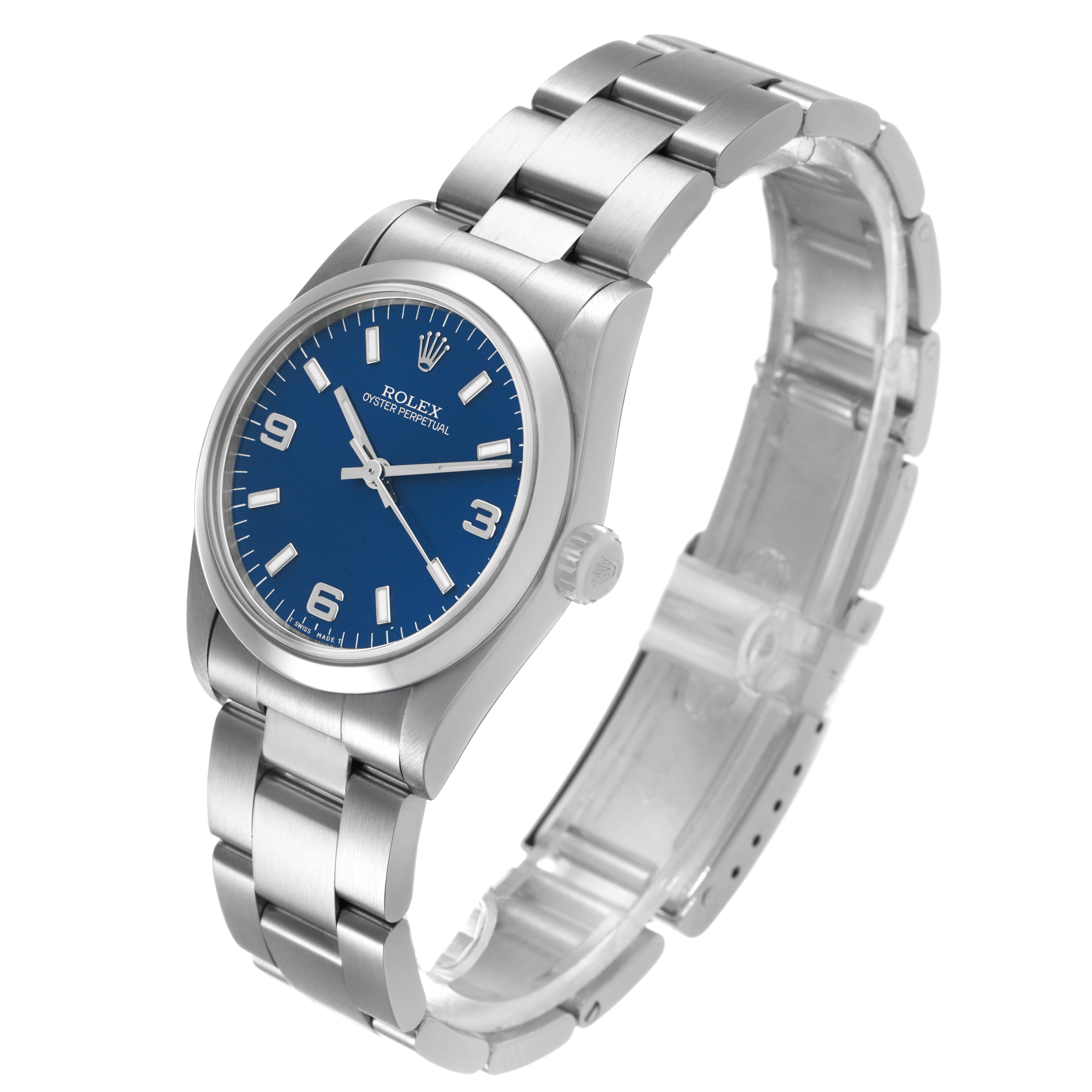 The image shows a Rolex Mid-Size 67480 Women's Stainless Steel Blue Dial watch from a three-quarter angle, displaying the face, bezel, bracelet, and crown.