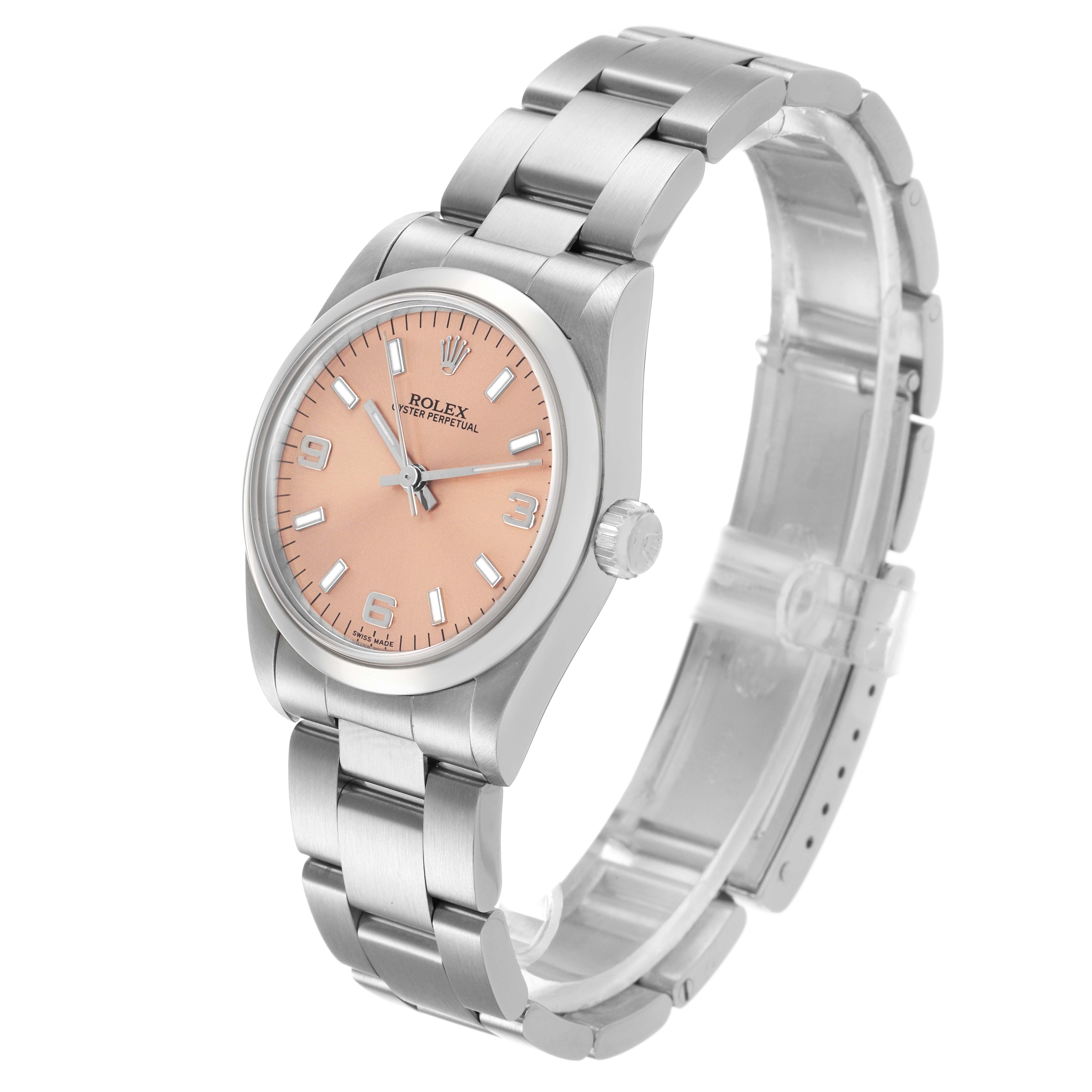 The Rolex Mid-Size 67480 Women's Stainless Steel Pink Dial watch is shown at a three-quarter angle, highlighting its dial, bracelet, and clasp.