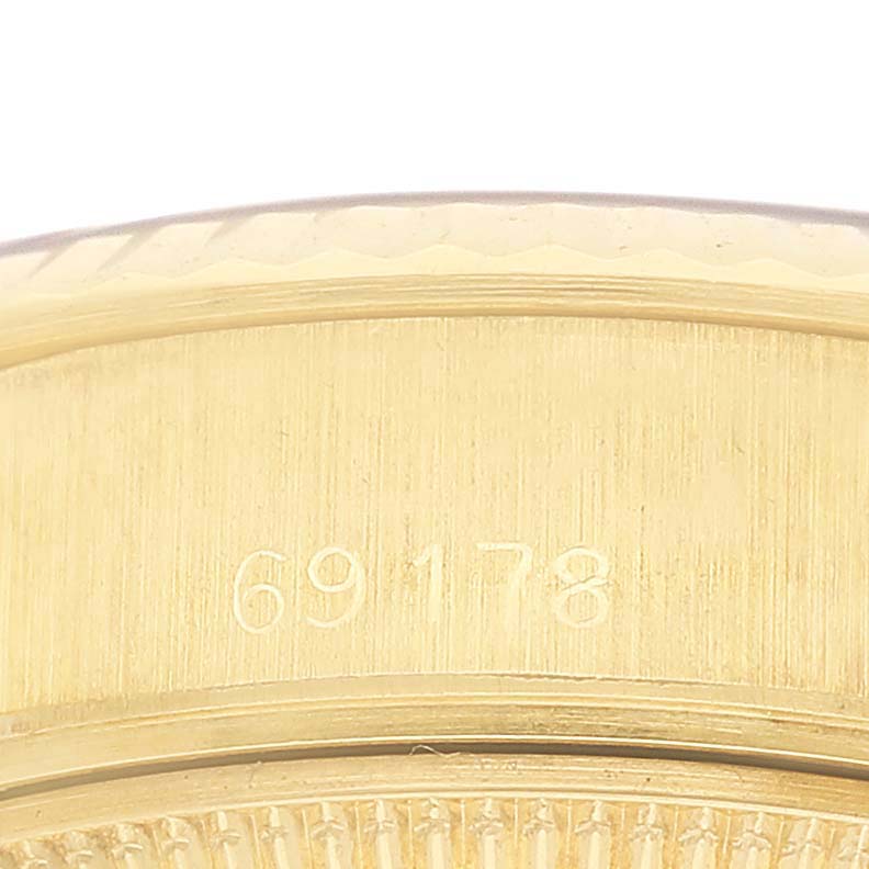 The image shows a close-up of the side of a Rolex President 69178 Women's Yellow Gold Black Dial watch, highlighting the watch's model number.