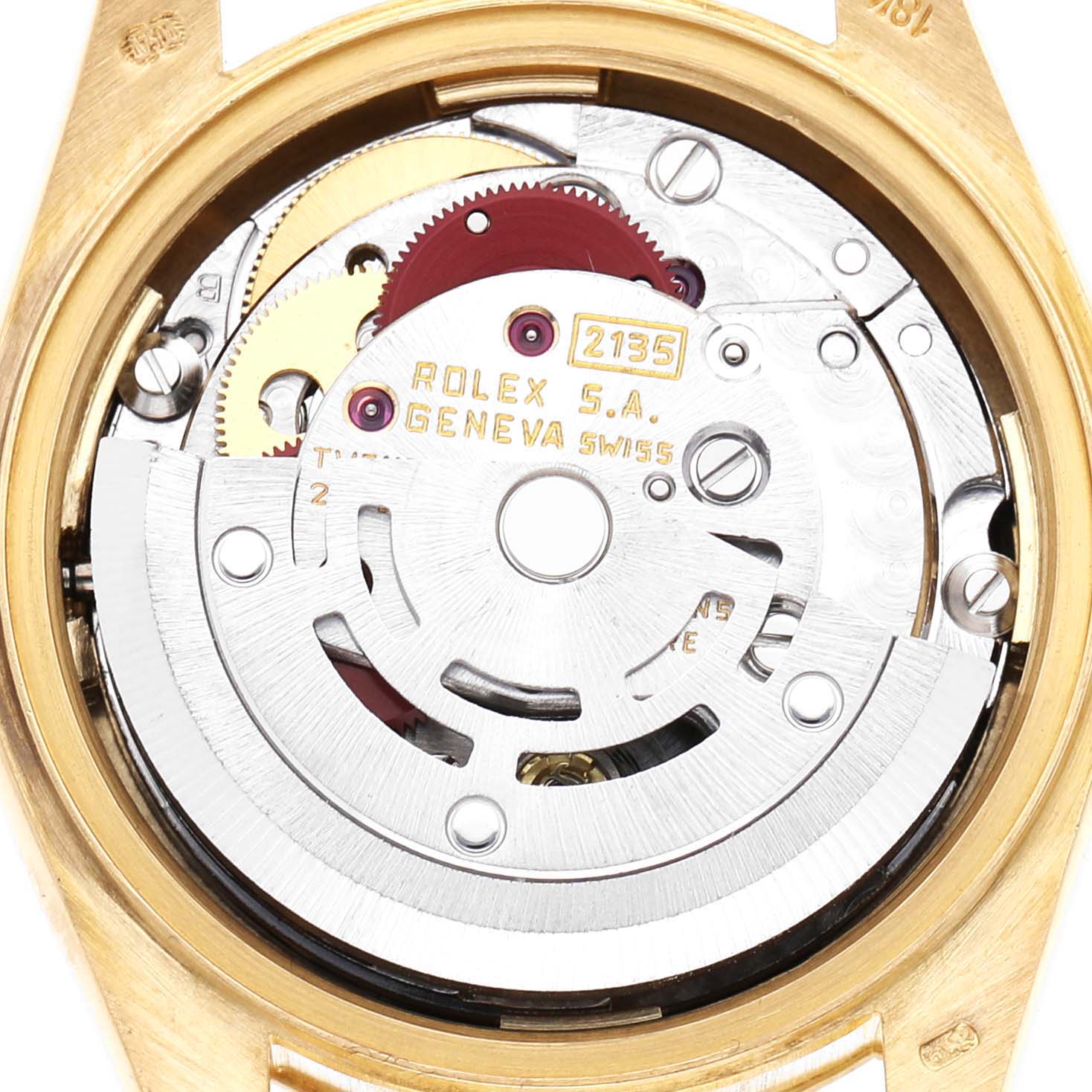 The image shows the internal movement of a Rolex President 69178 Women's Yellow Gold Black Dial watch, highlighting gears and engravings.